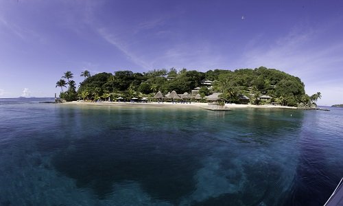 Waters edge view of Young Island, St Vincent and the Grenadines