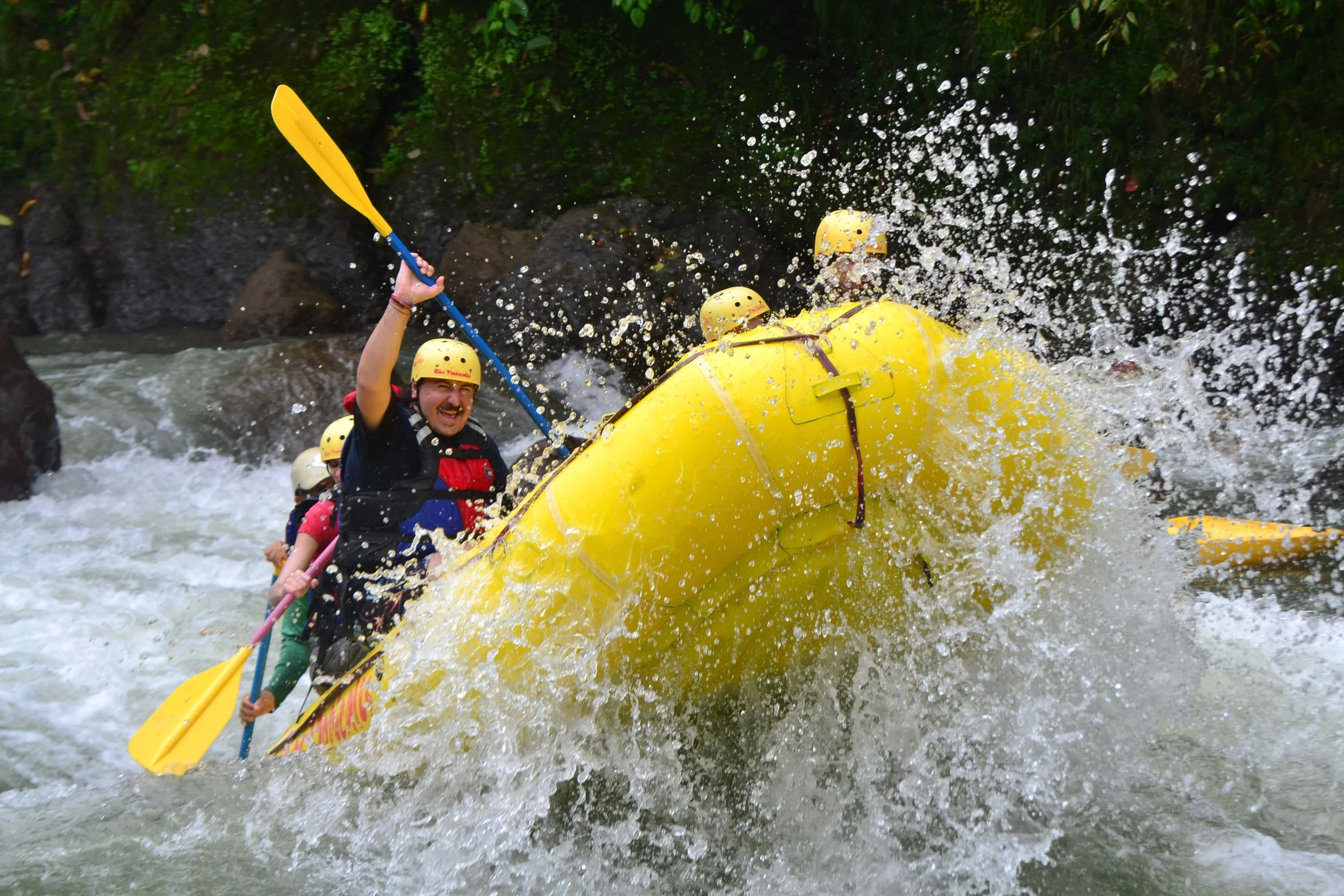 Group of people white-water rafting in Costa Rica