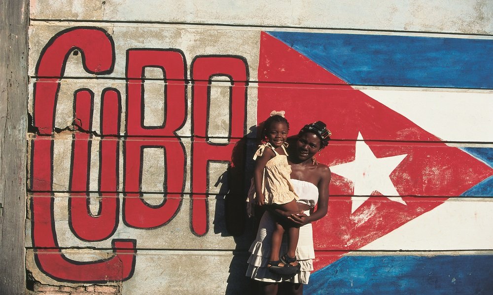 Cuba lady and flag