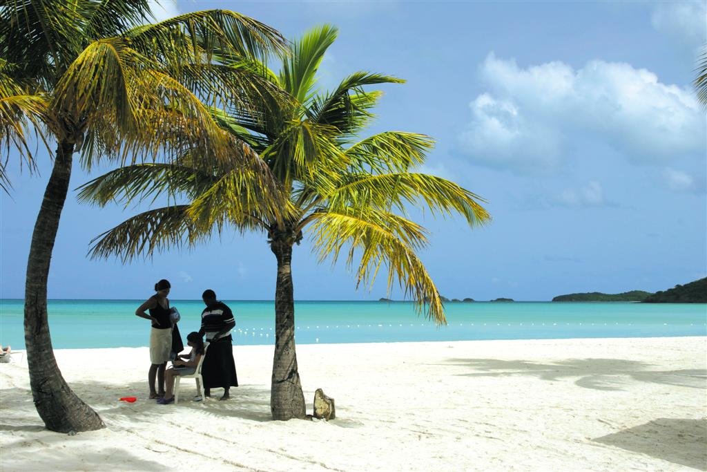 Hair braiding on the beach Antigua