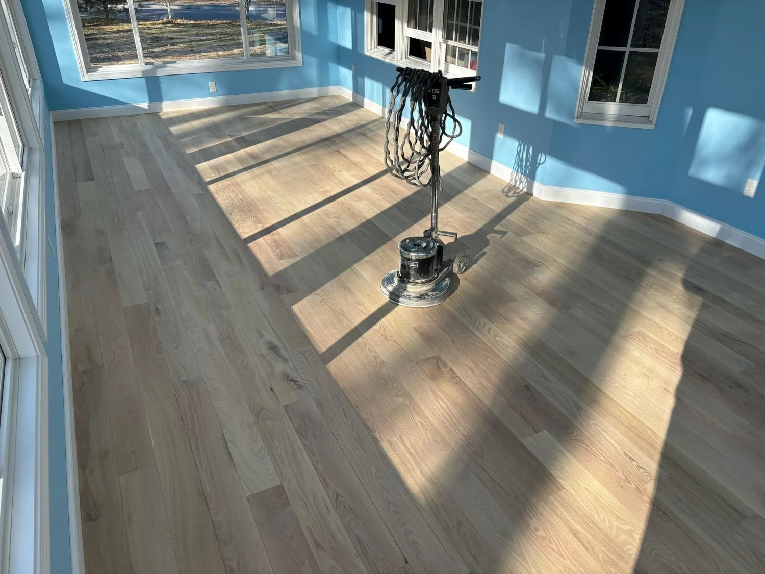 BLUE-ROOM-NEW-HARDWOOD-FLOORS.JPG