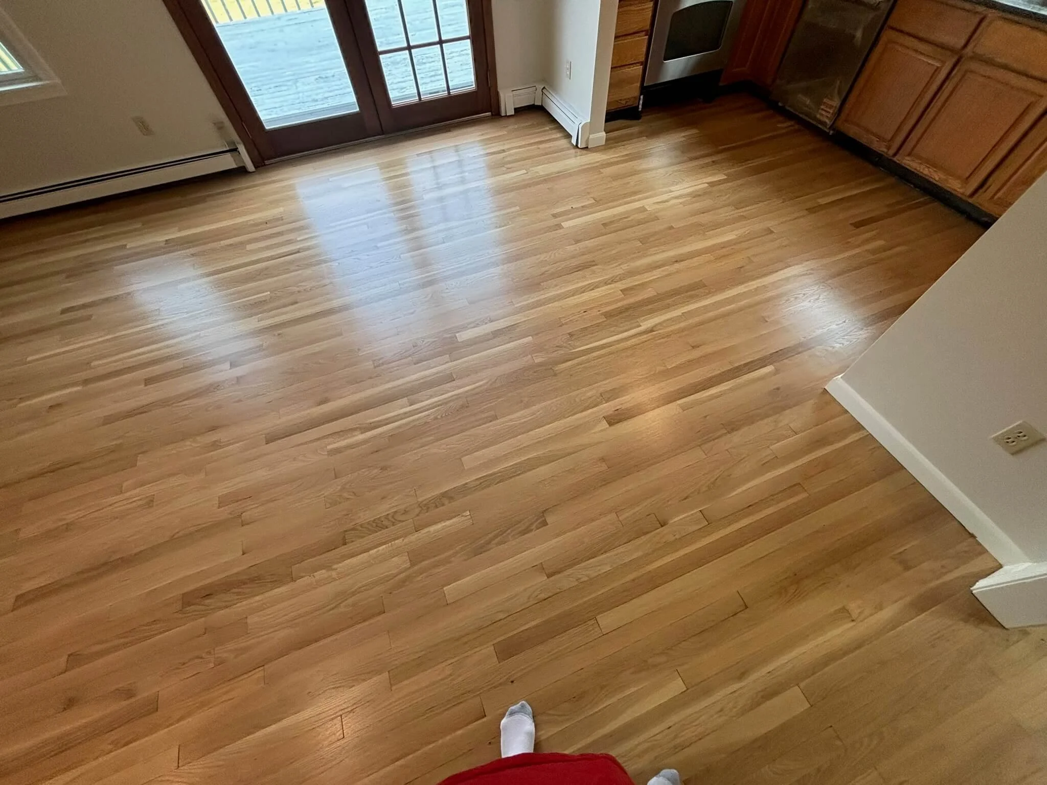 Living room hardwood flooring project in Westborough, MA.