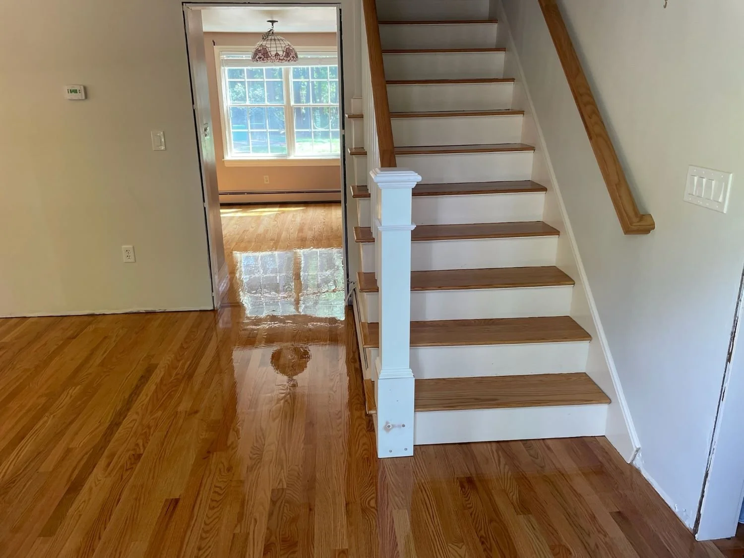 STAIRCASE-WITH-NEW-HARDWOOD-FLOORS.JPG