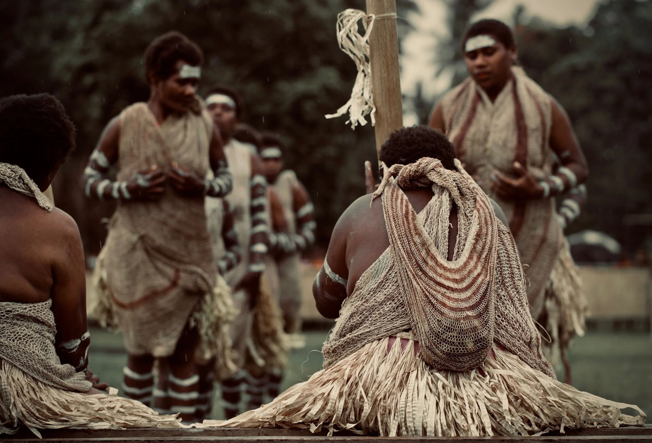 Portraits and candid moments of Papua New Guinea’s diverse cultures, featuring traditional dress, masks, and ceremonial performances.