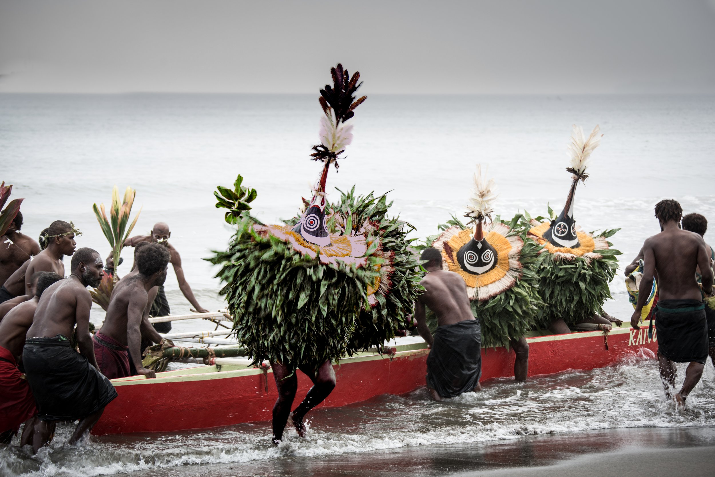 Portraits and candid moments of Papua New Guinea’s diverse cultures, featuring traditional dress, masks, and ceremonial performances.