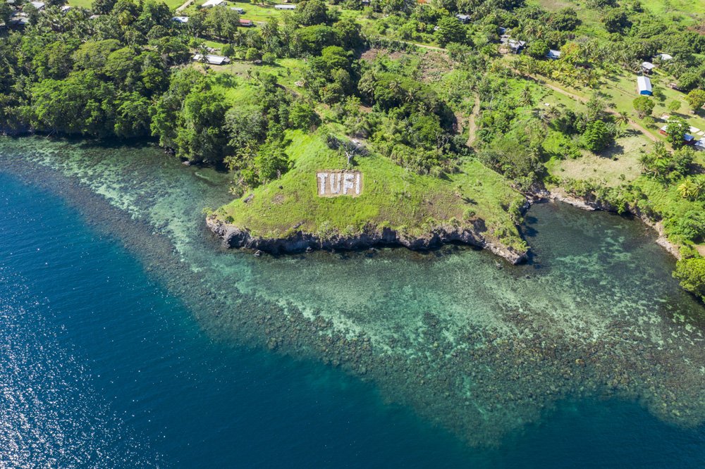 Scenic views from across Papua New Guinea, capturing tropical coastlines, lush landscapes, and tranquil waters.