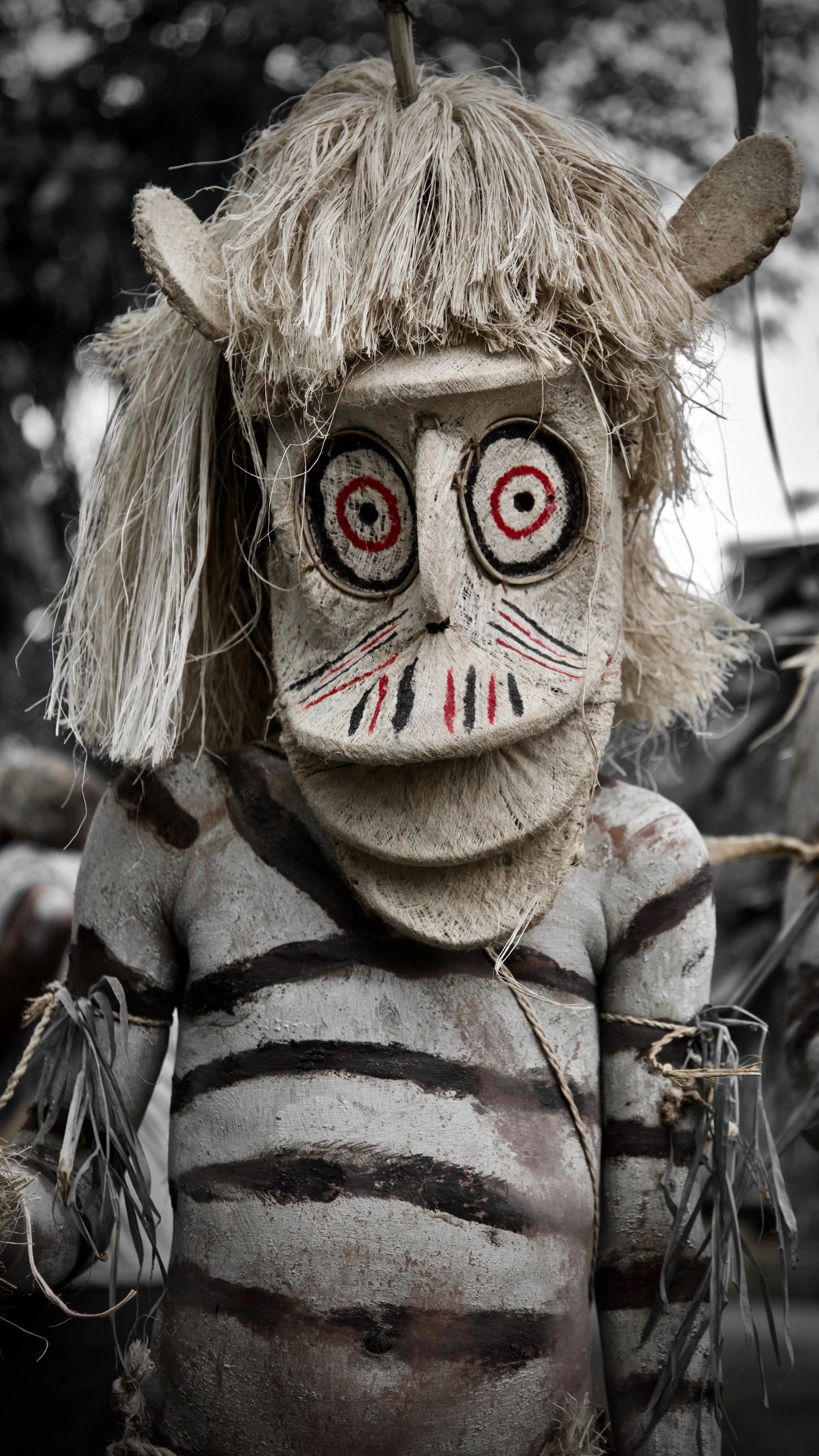 Portraits and candid moments of Papua New Guinea’s diverse cultures, featuring traditional dress, masks, and ceremonial performances.