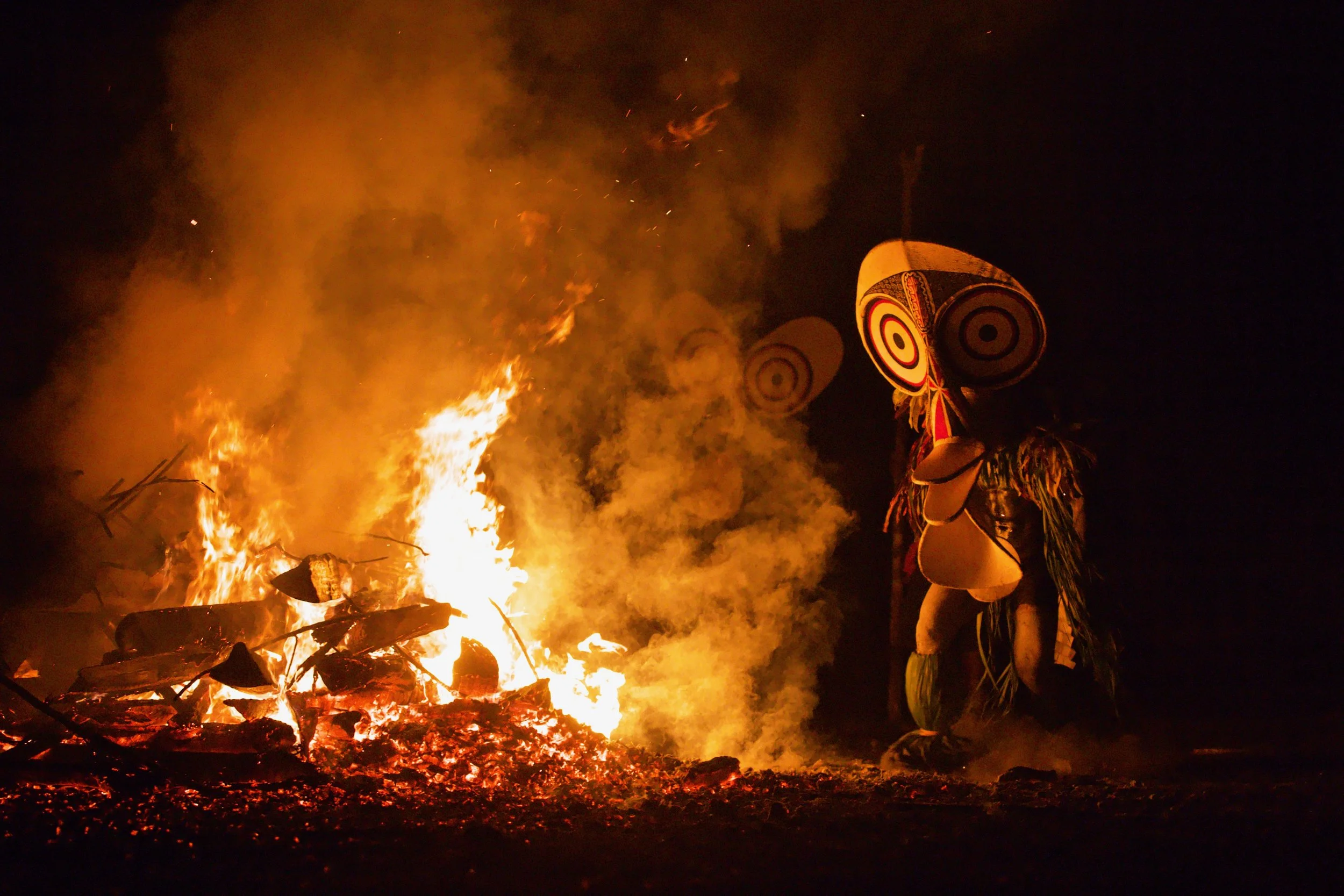 Portraits and candid moments of Papua New Guinea’s diverse cultures, featuring traditional dress, masks, and ceremonial performances.