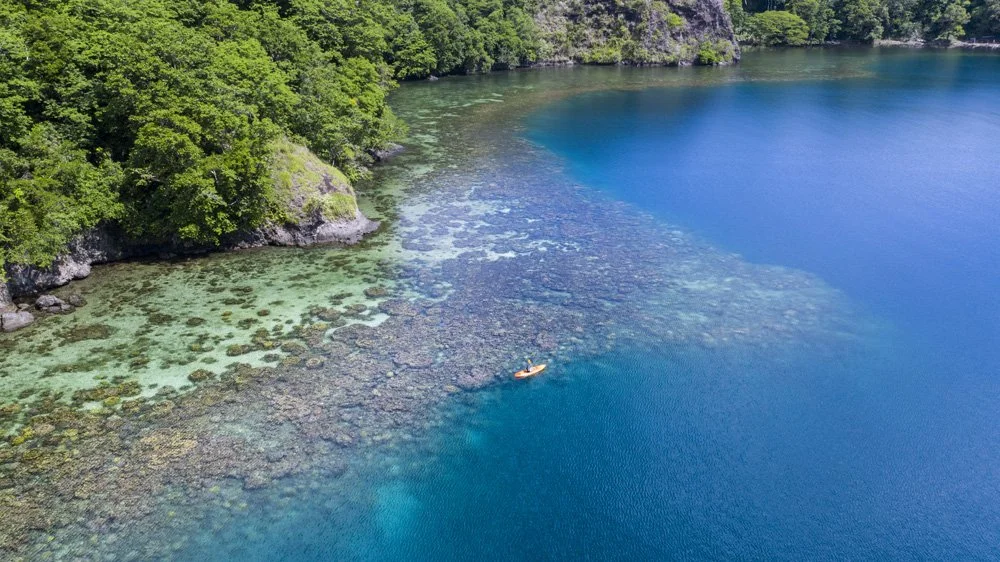 Scenic views from across Papua New Guinea, capturing tropical coastlines, lush landscapes, and tranquil waters.