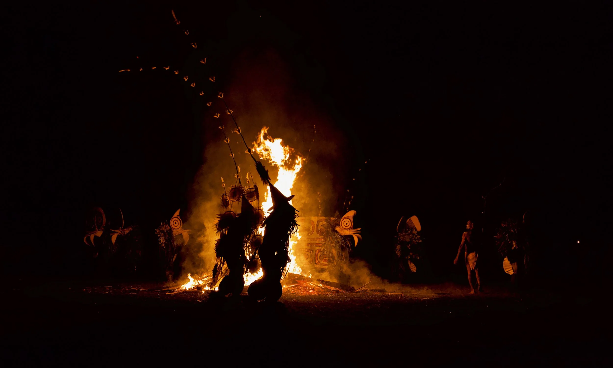 Portraits and candid moments of Papua New Guinea’s diverse cultures, featuring traditional dress, masks, and ceremonial performances.