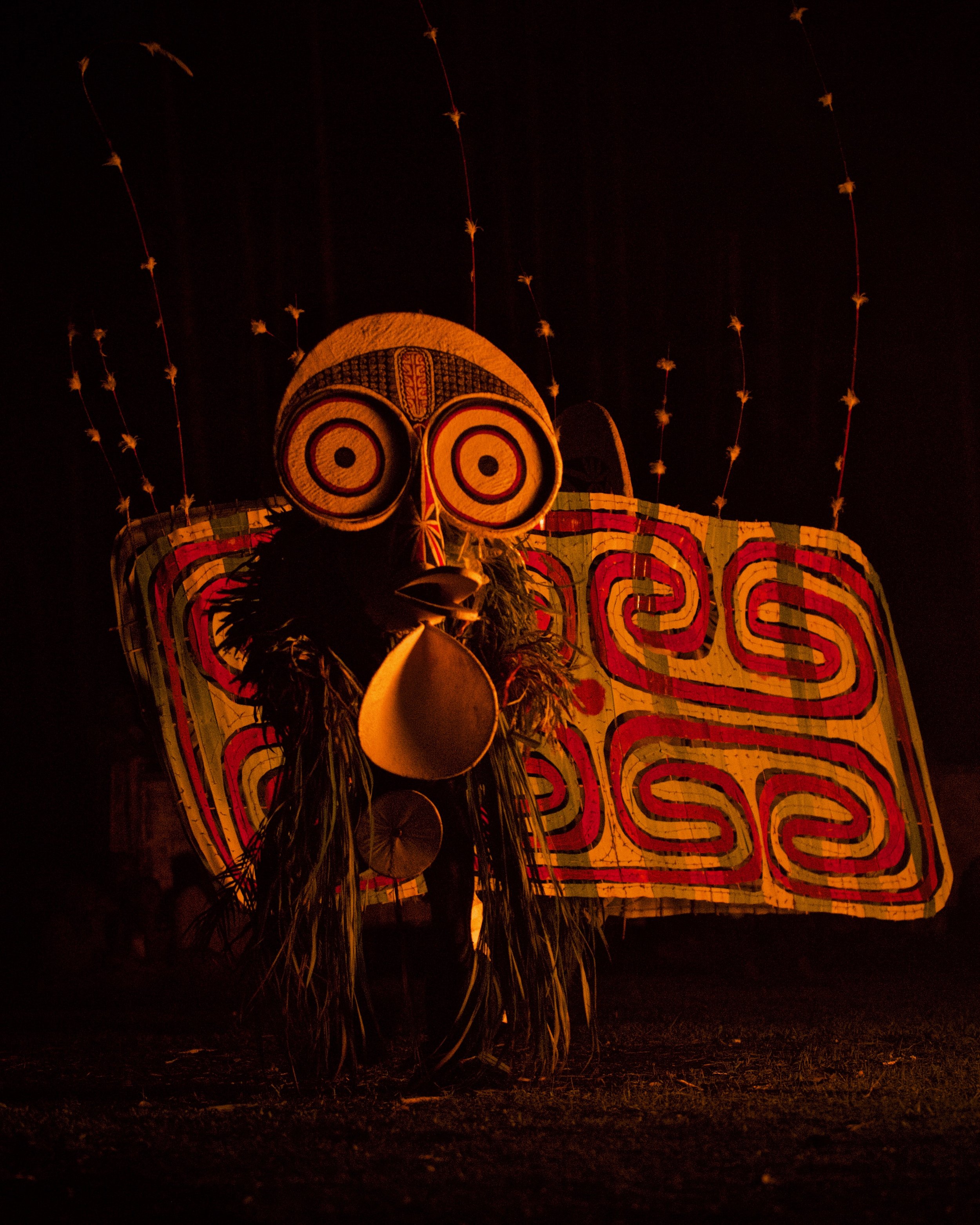 Portraits and candid moments of Papua New Guinea’s diverse cultures, featuring traditional dress, masks, and ceremonial performances.