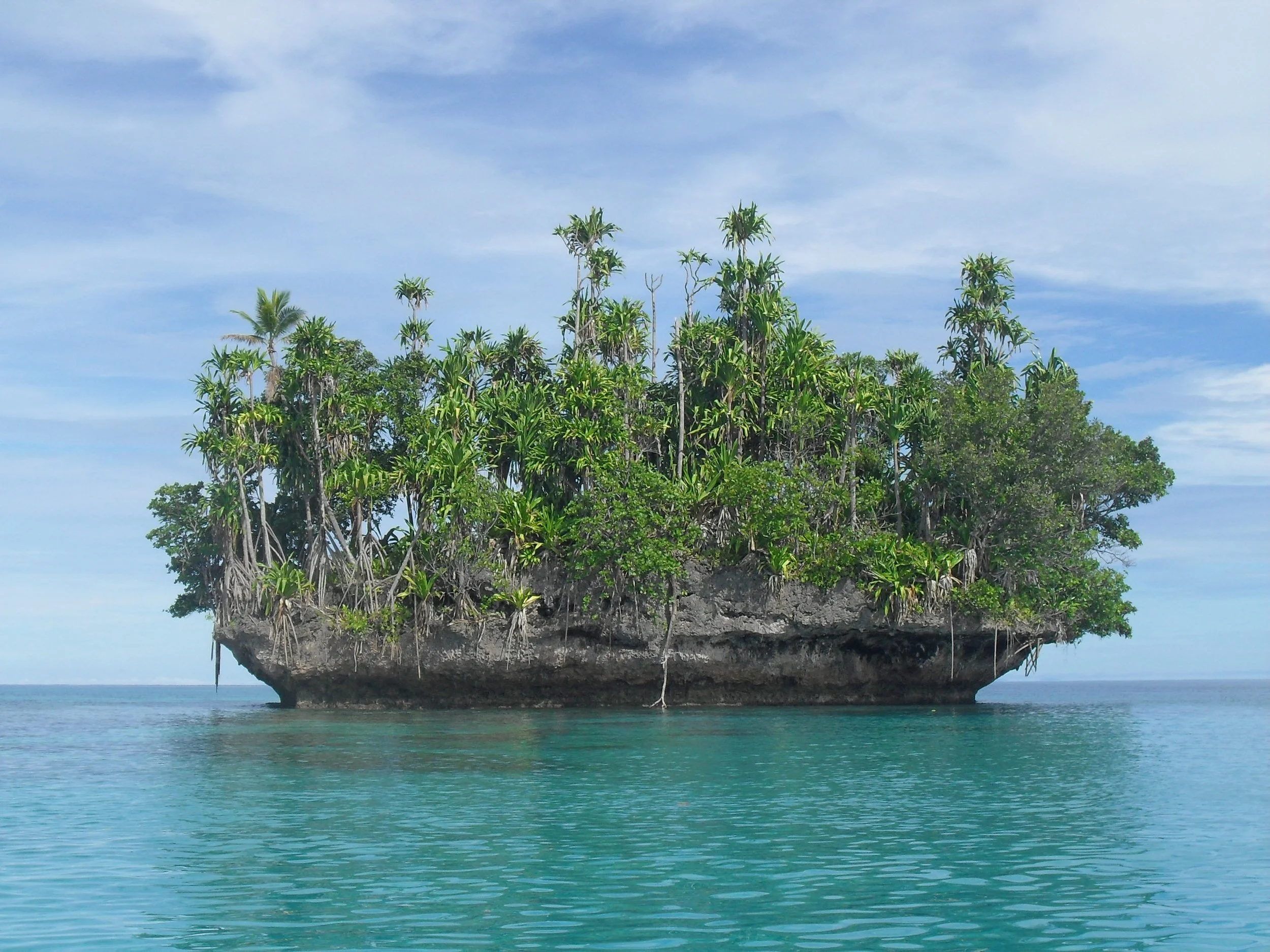 Scenic views from across Papua New Guinea, capturing tropical coastlines, lush landscapes, and tranquil waters.