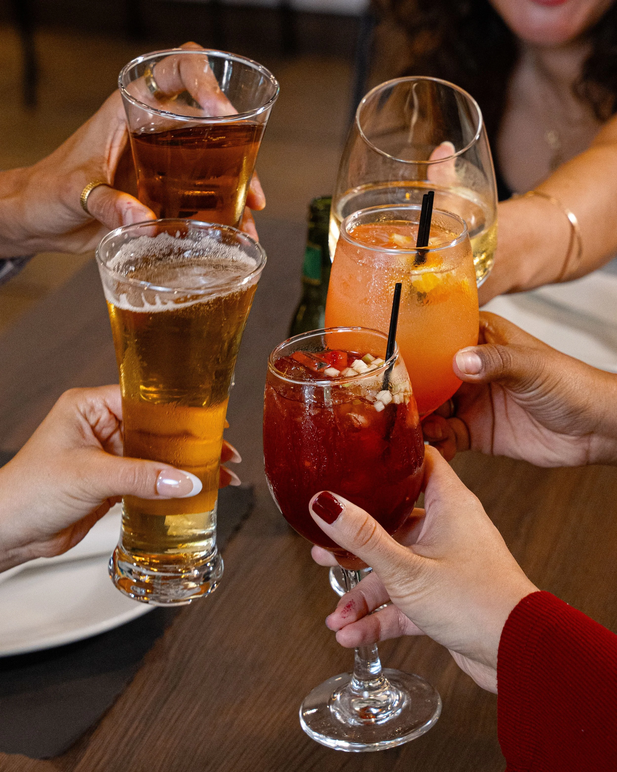 A glass chicha sour, is a mix os chicha morada and pisco sour.