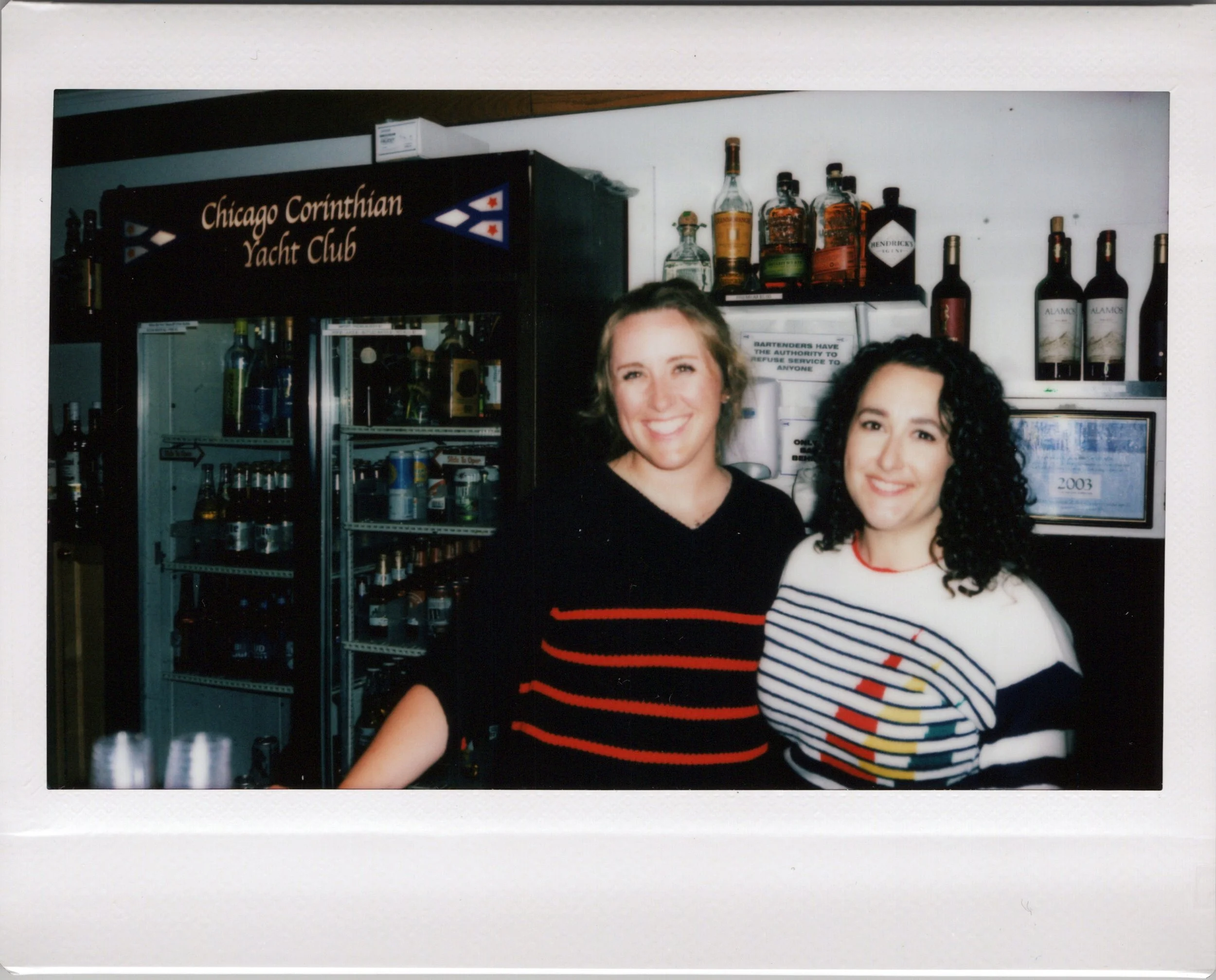 Onsite instant photography in chicago of bartenders at yacht club.