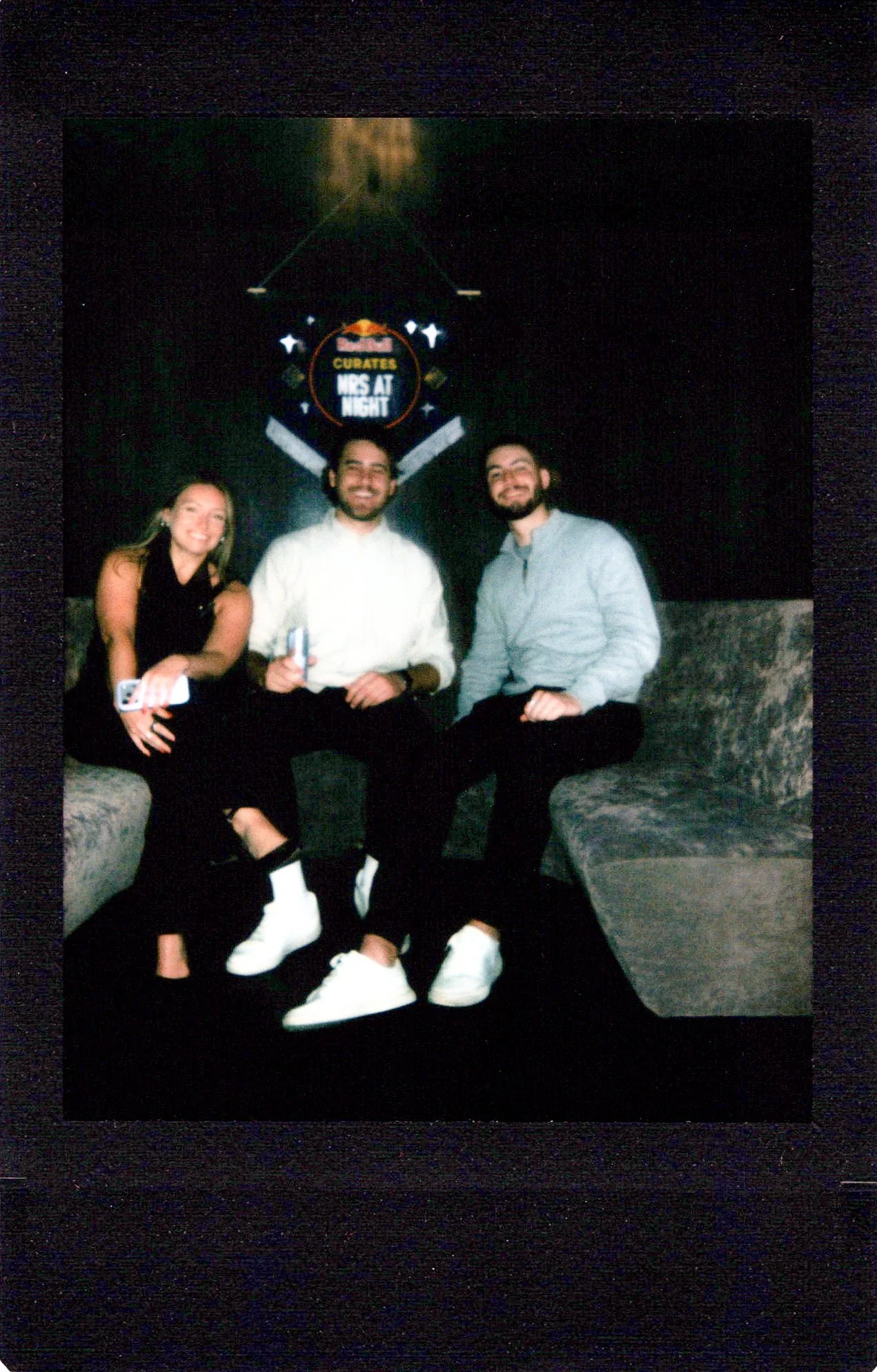 Black instant photo of guests at a premium Red Bull event in Chicago for NRS week.