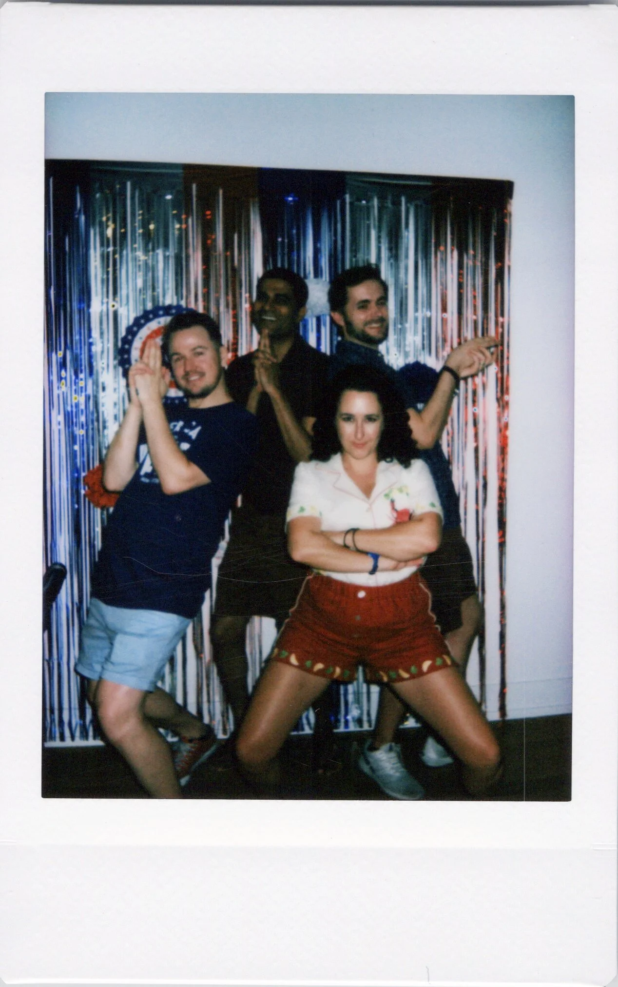 Four people posing for a July 4th celebration in chicago