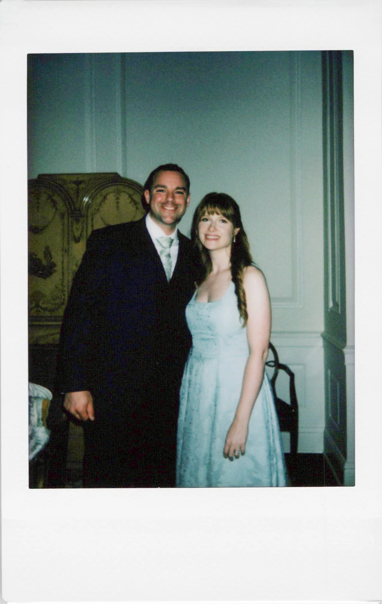 Guests pose in an instant photo at a chicago wedding, not a photo booth photo