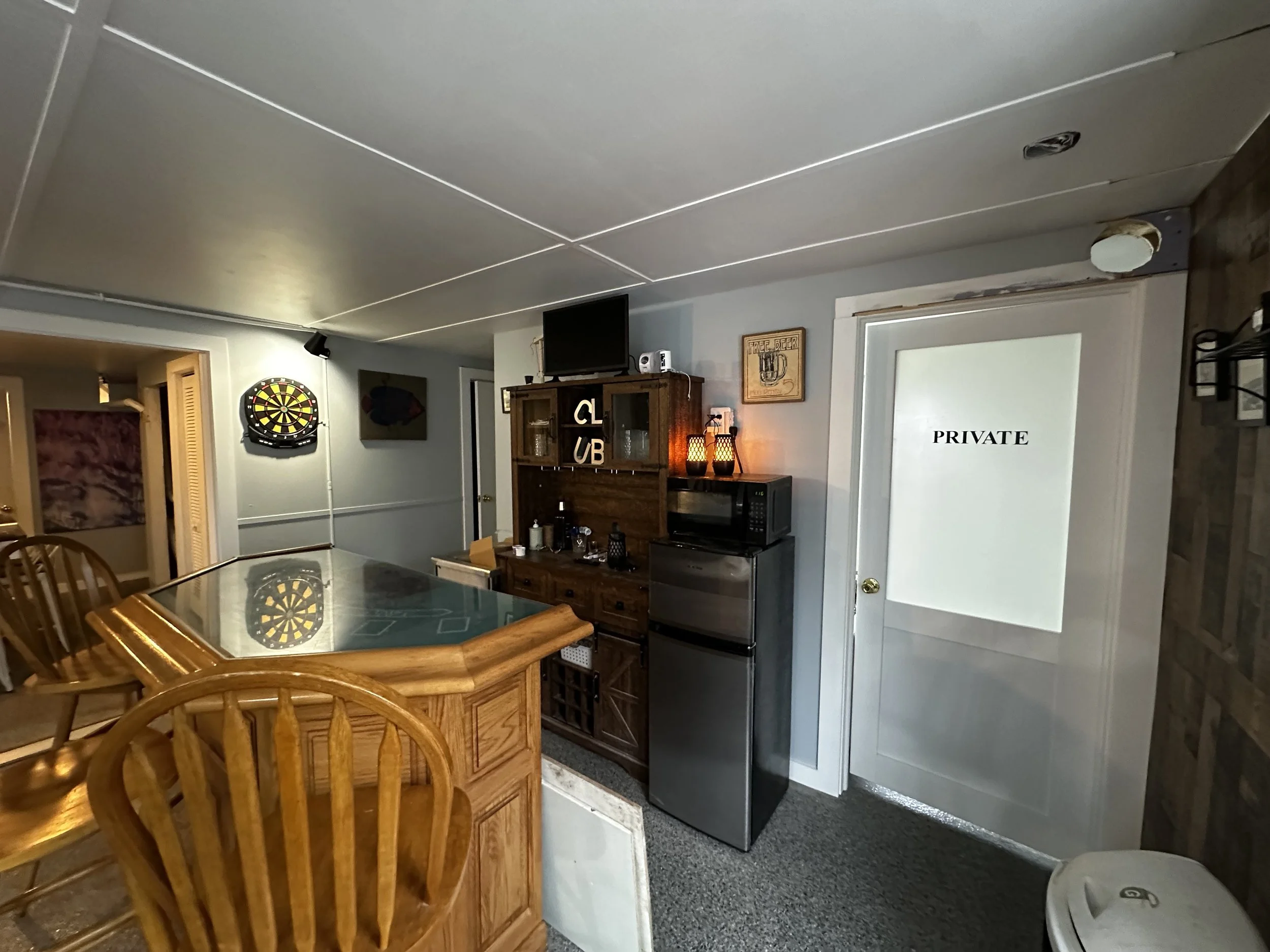 Game Room to Grooms Suite Lounge 1.jpg