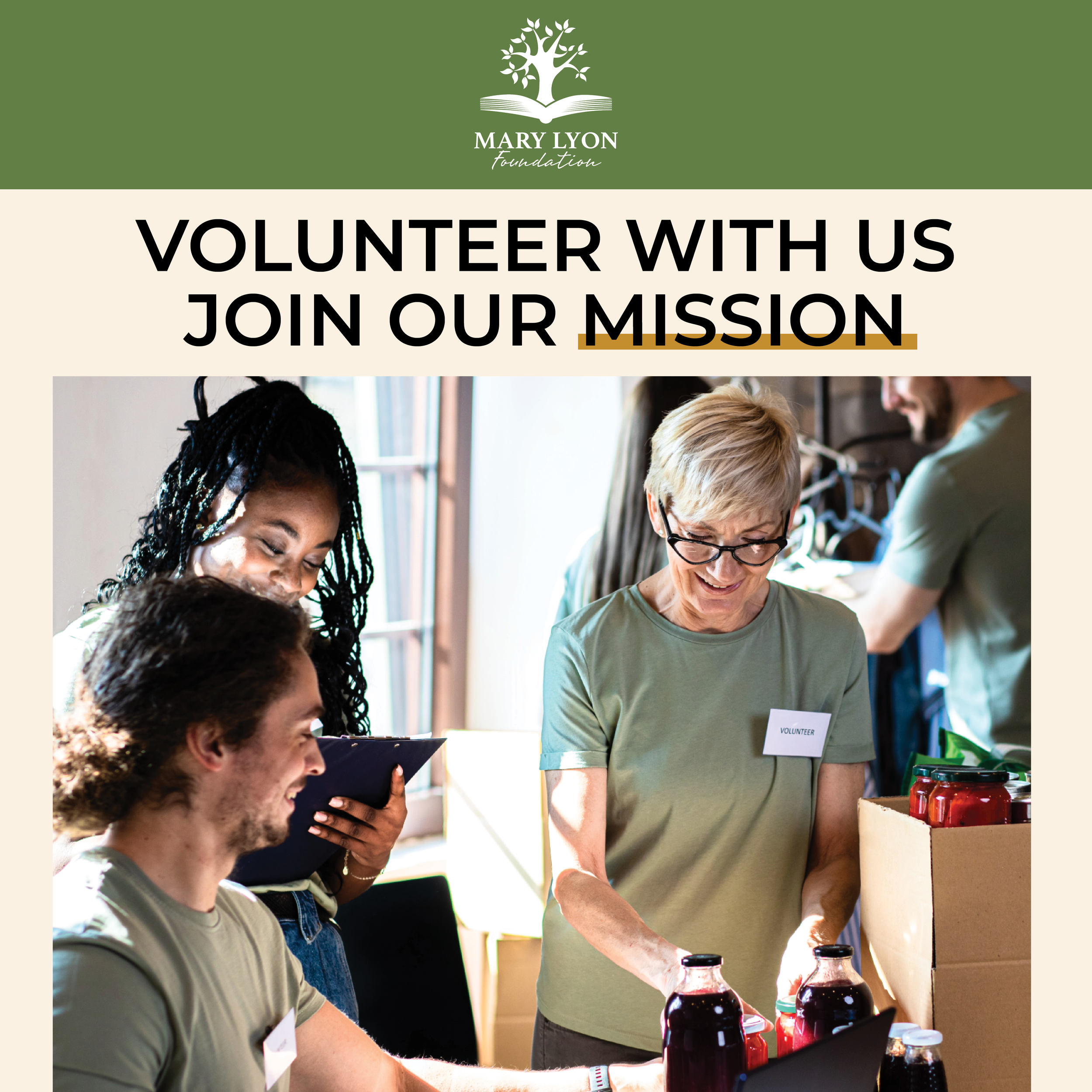 Group of volunteers packing food jars at a charity event, with smiling faces and a Mary Lyon Foundation banner in the background.