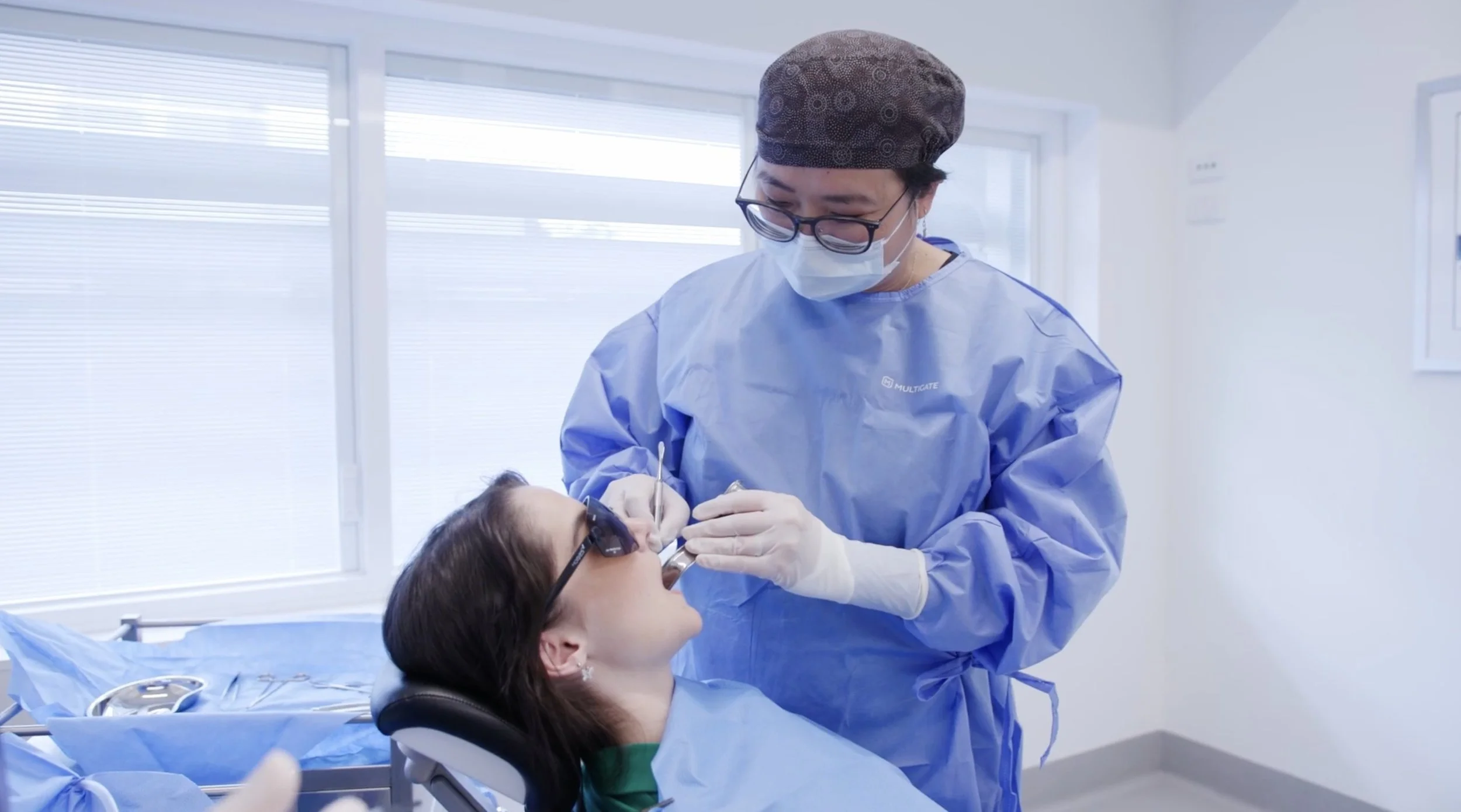 Dr Sophia Richardson operating under local anaesthesia in her North Fitzroy practice