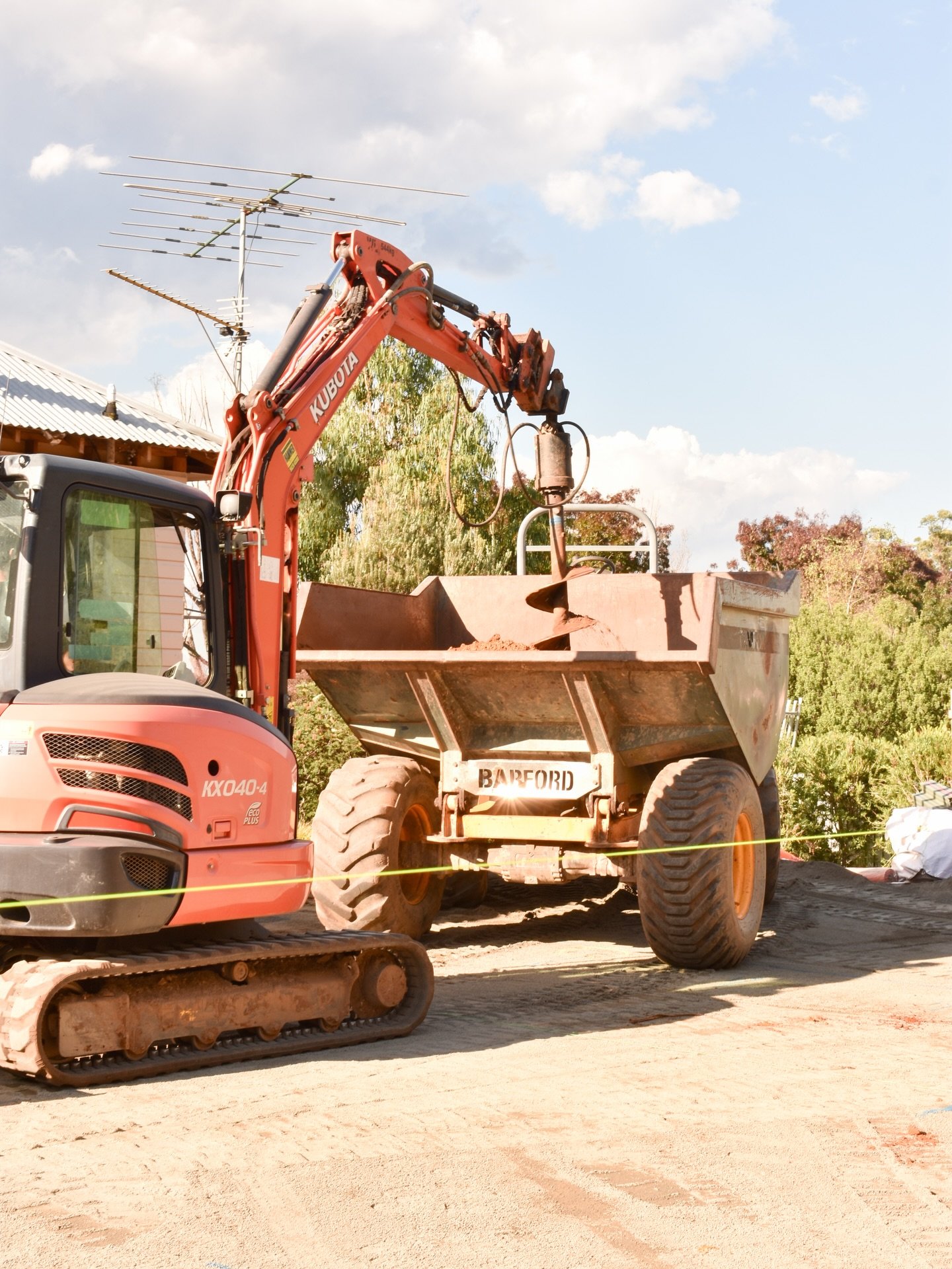 Drilling piers, getting them down to rock to create a stable foundation for the build to come. Piers create structural support, preventing structural damage. They ensure the structure is anchored in firm soil or rock to prevent sinking.