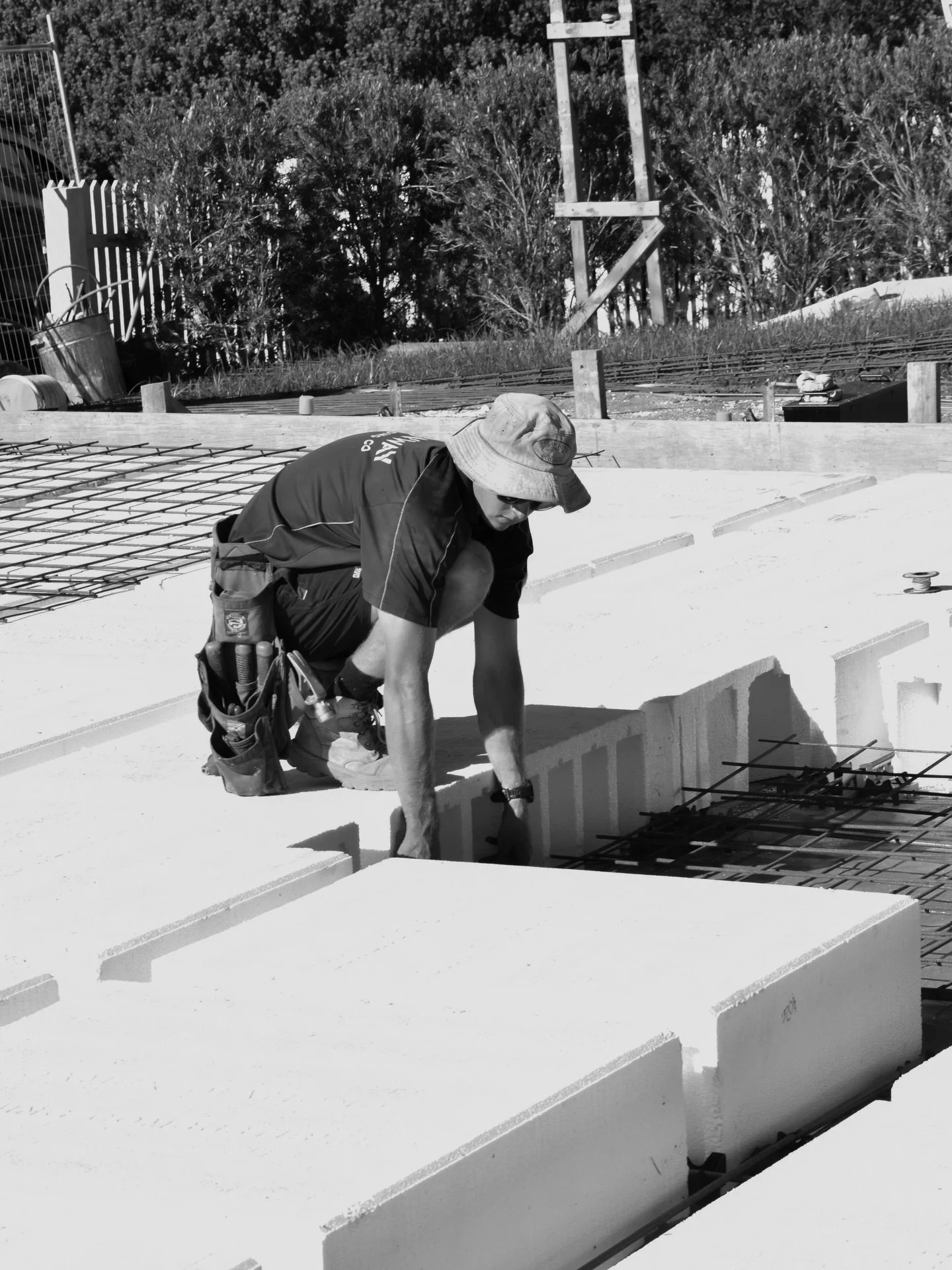 Tom and Ben getting the waffle pods in. These pods are designed to create voids, provide thermal insulation and reduce the amount of concrete necessary by creating stiffened beams within the slab.

Next up - Steel reinforcement mesh is then placed on
