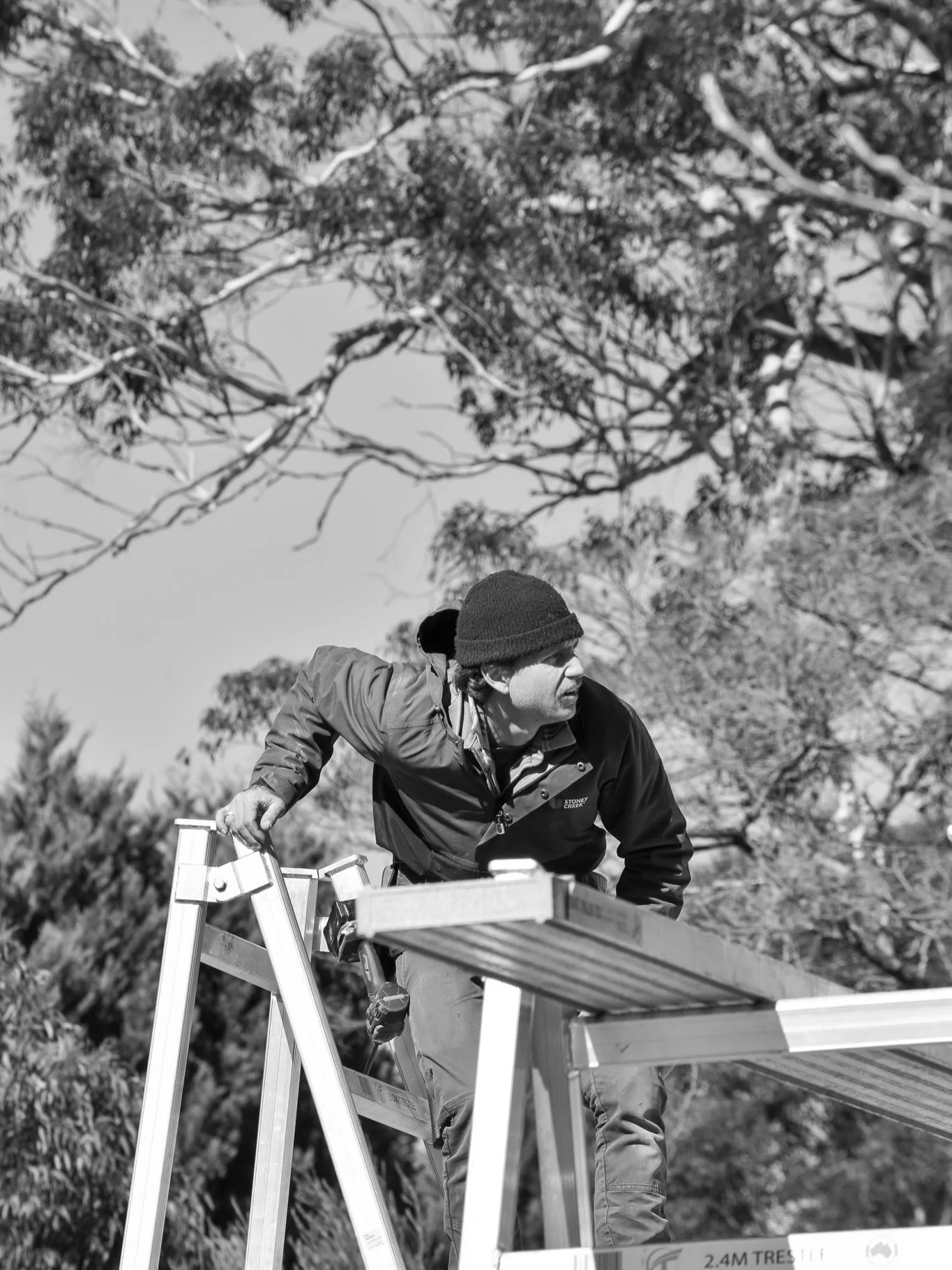 Joey getting the finishing touches on the roof at Nero St. Full reroof and add-on for this one.