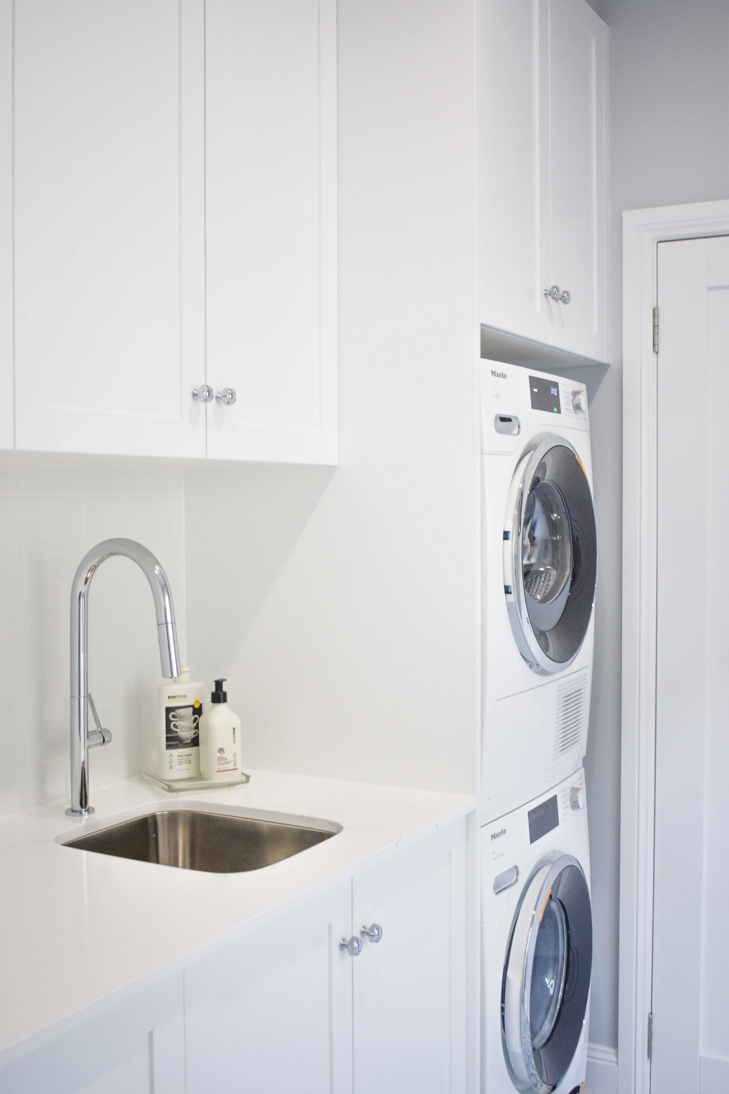 stacked water and dryer in the laundry renovation