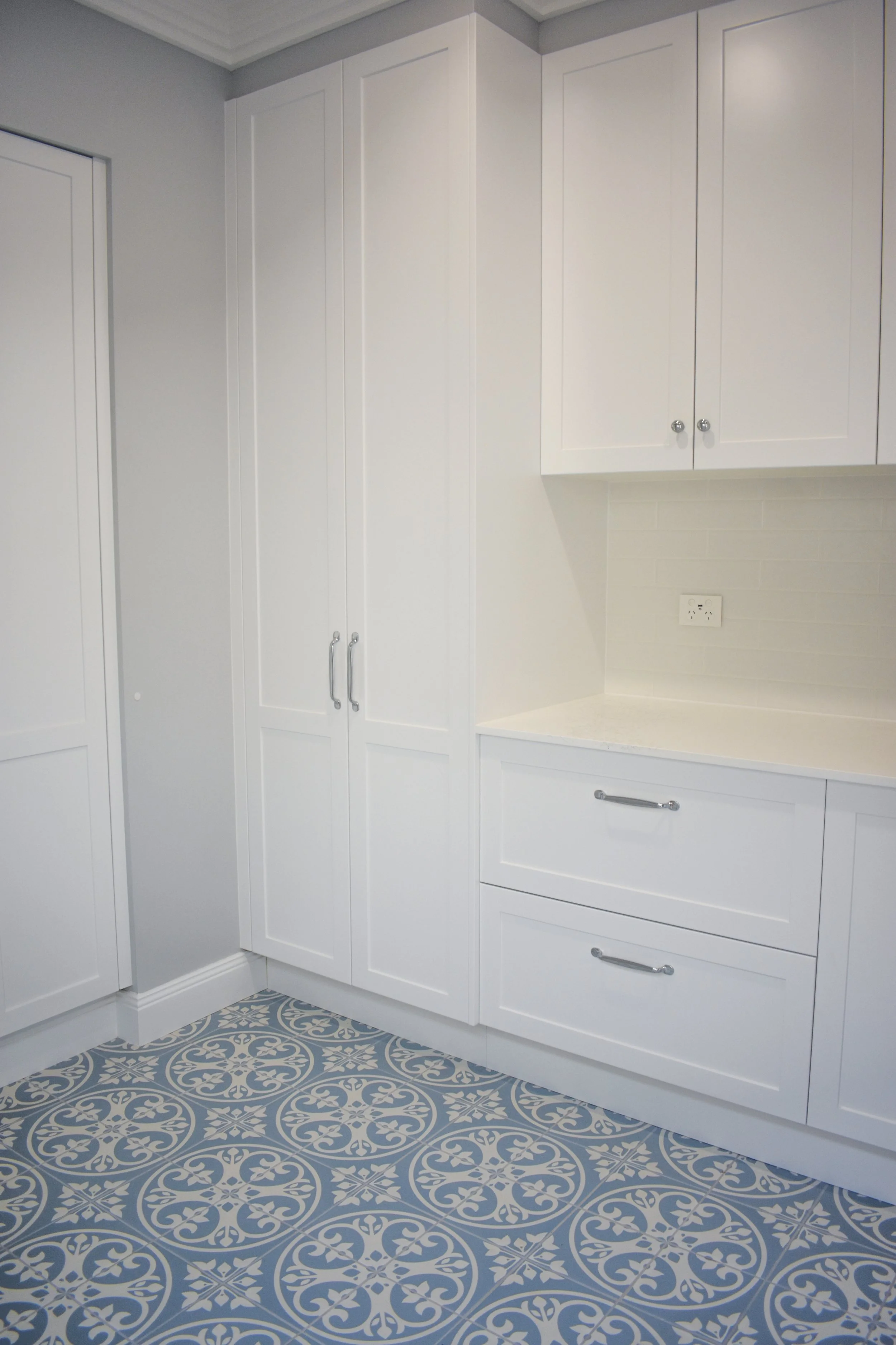 Cabinetry in the laundry renovation