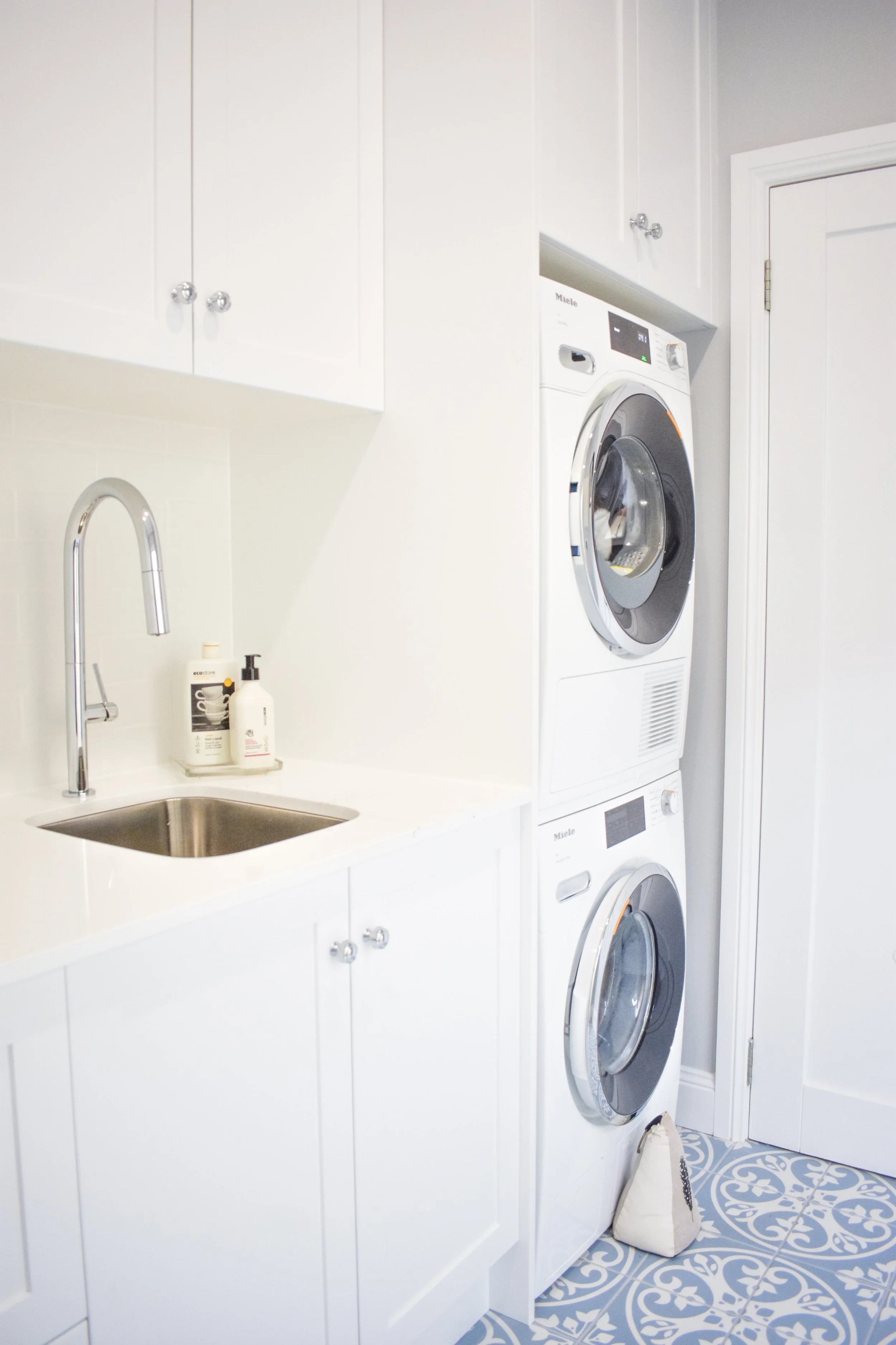 Cabinetry, sink and washer and dryer  in the Mittagong laundry renovation