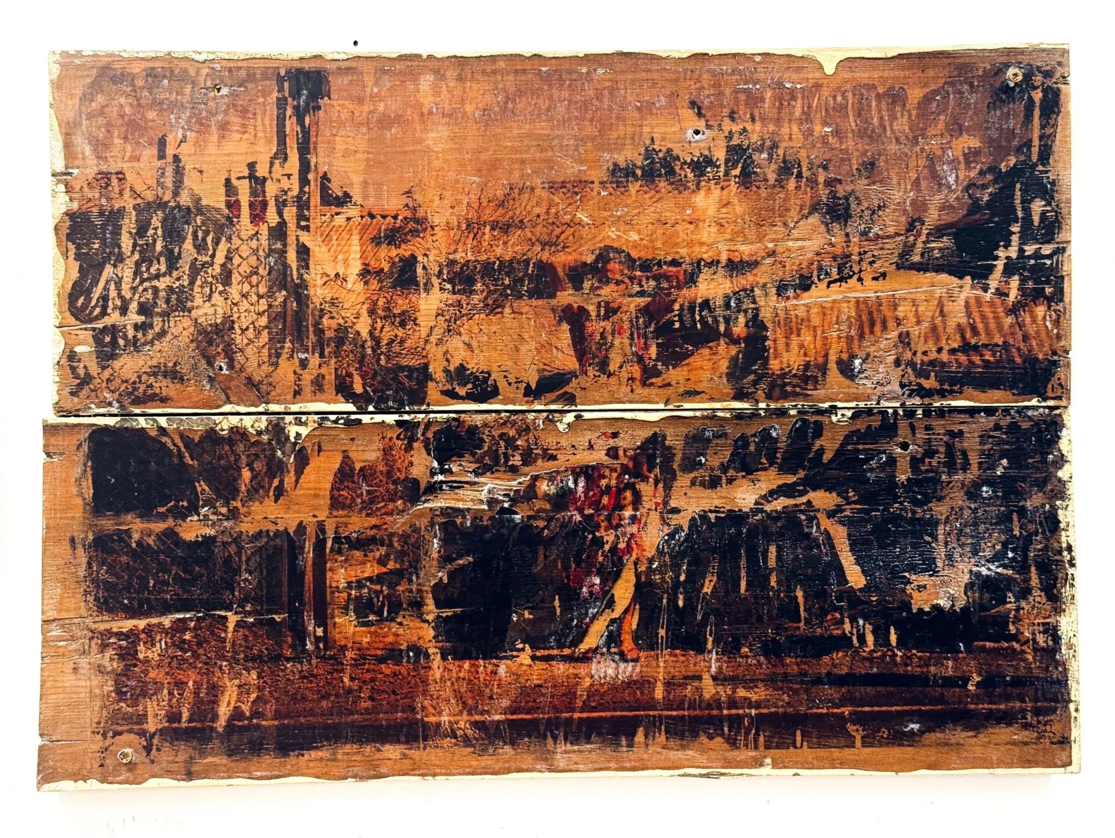 Close-up of a weathered wooden pieces, featuring an image of a woman trasnferred onto the surface.