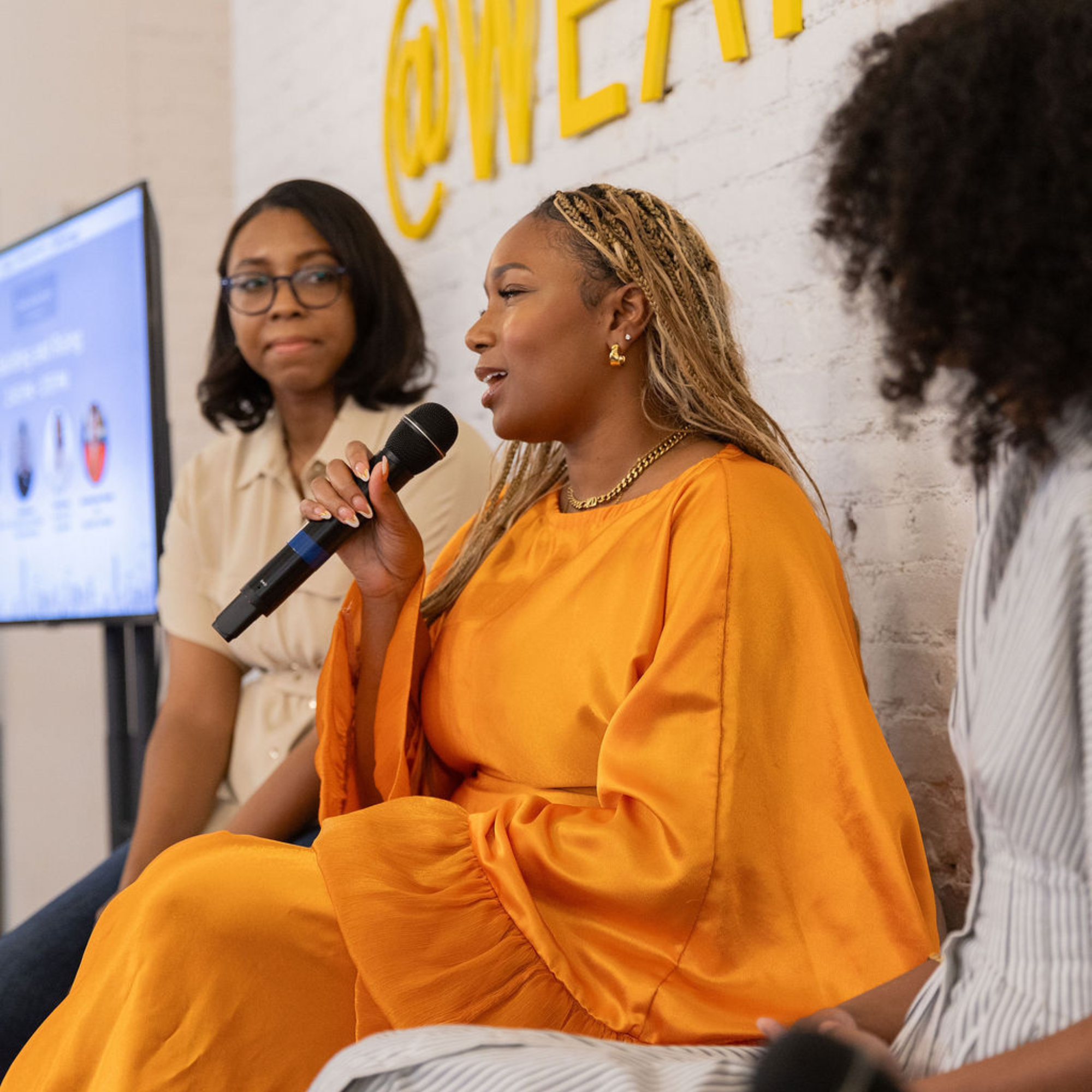 Kadidja Dosso speaking on a panel discussion at Luminary during August Black Business Month in 2025
