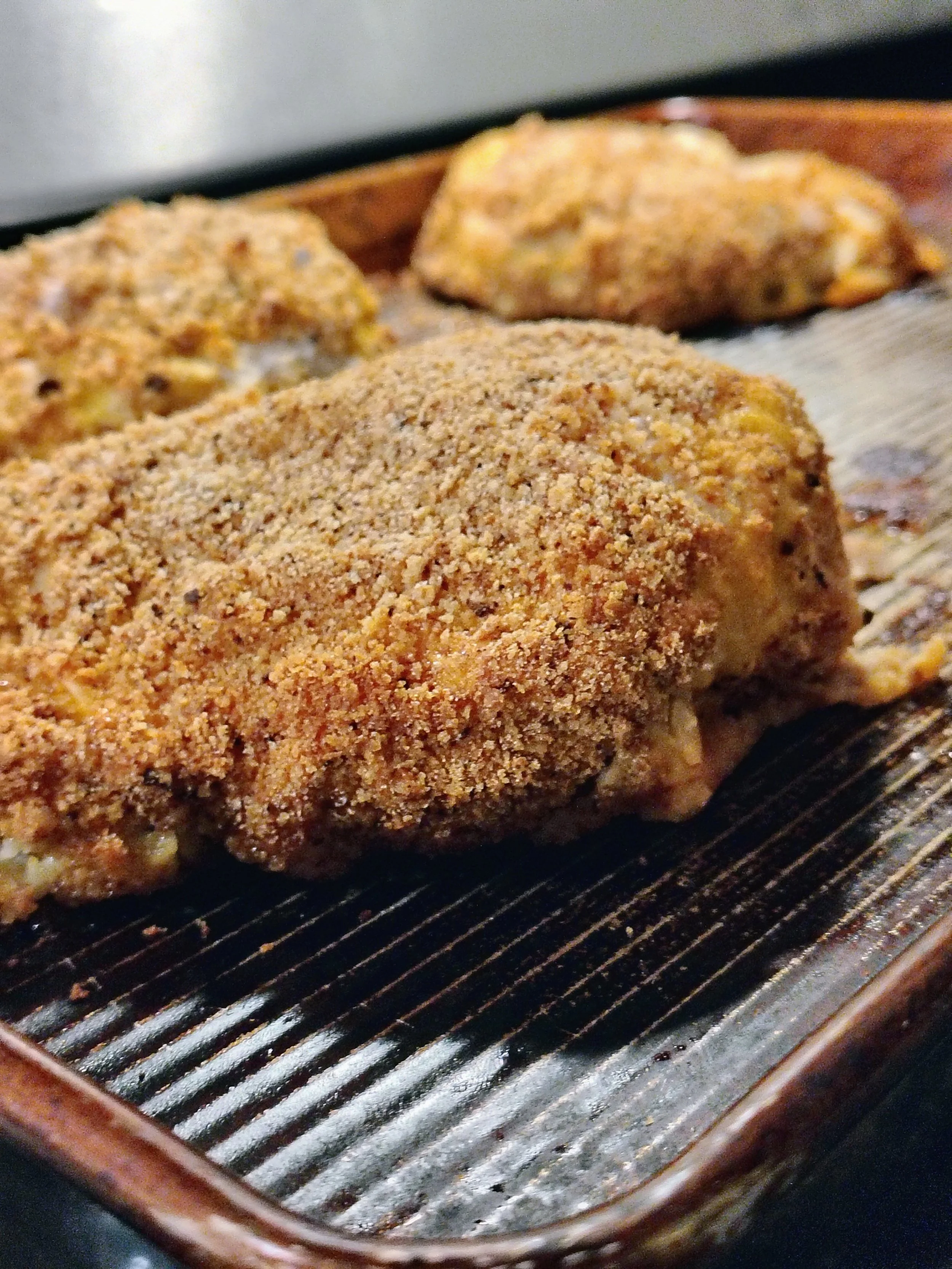 Breadcrumb crusted chicken baked on a sheet pan