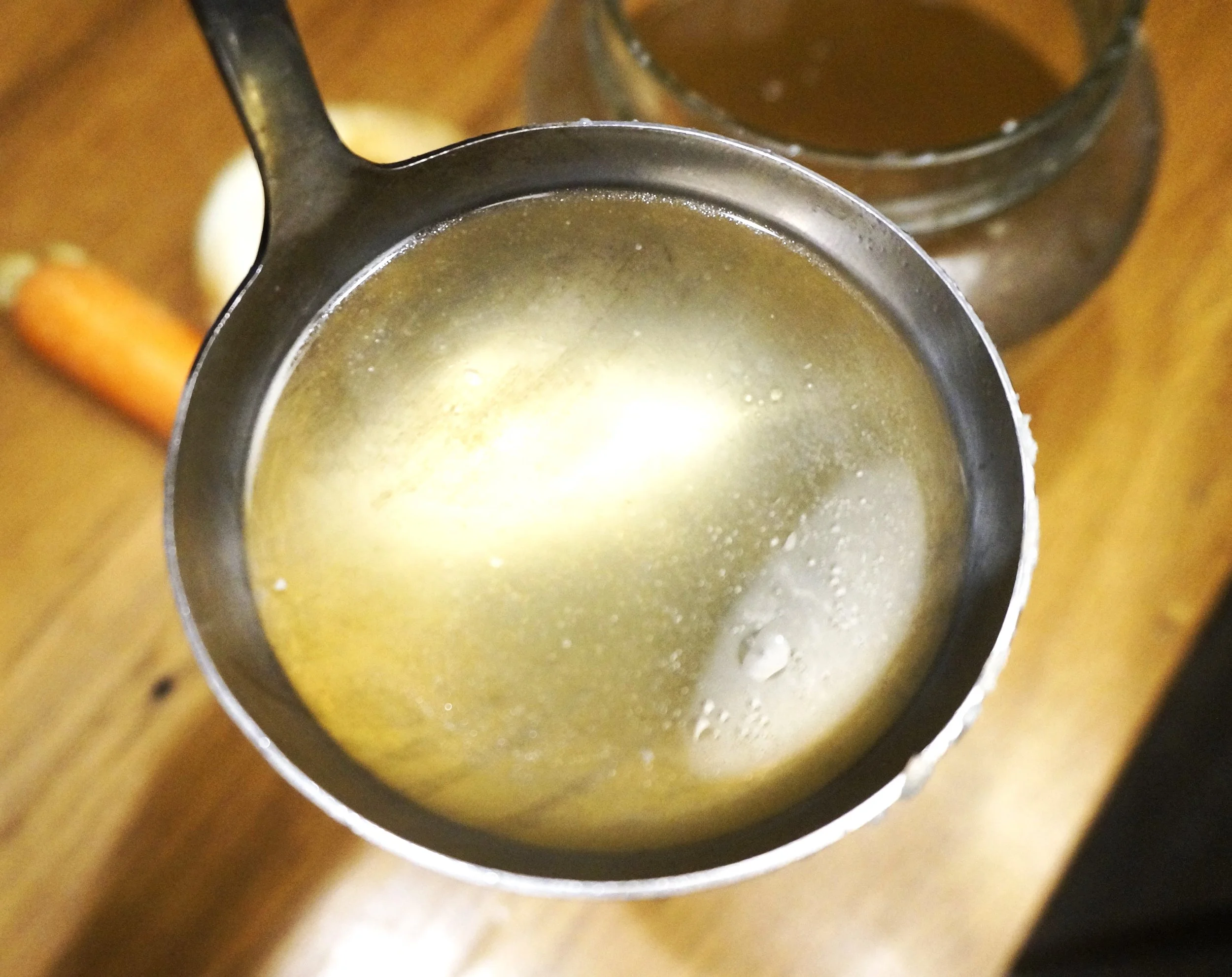 Homemade stock in a glass jar