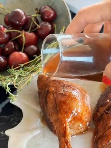 Crispy roast duck legs with oranges or cherries