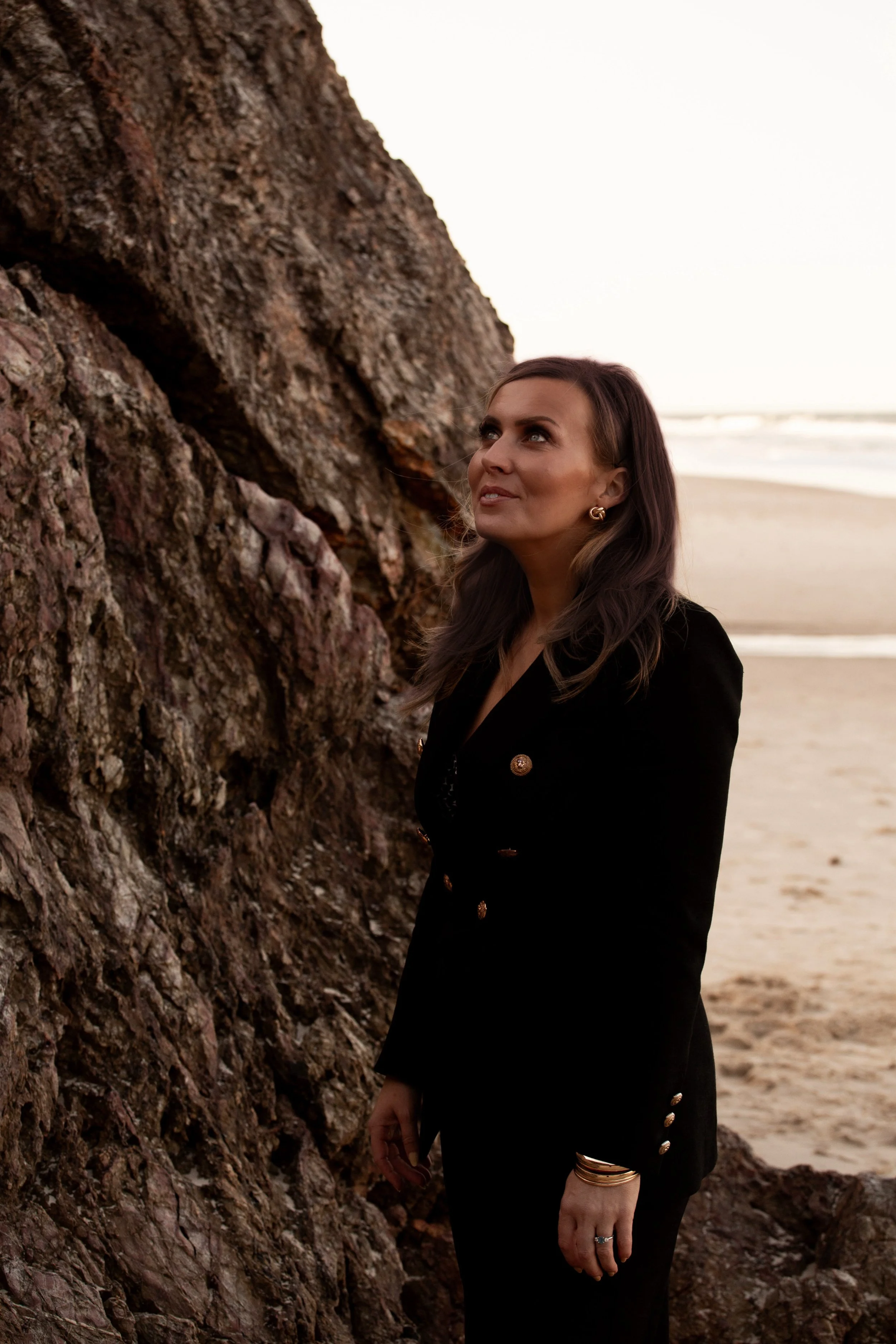 Megan Darnell, an Internal Family Systems therapist specialising in emotional eating and self-sabotage, pictured in a portrait on her therapy website.