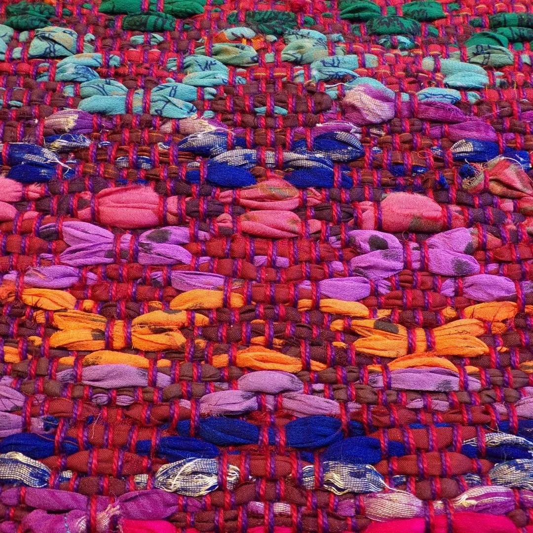 Sari silk overshot through cotton in a 'rose garden' weave