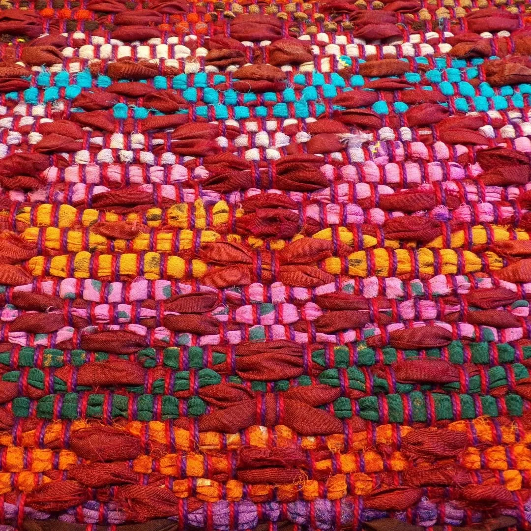 Sari Silk overshot through cotton in a 'rose garden' weave