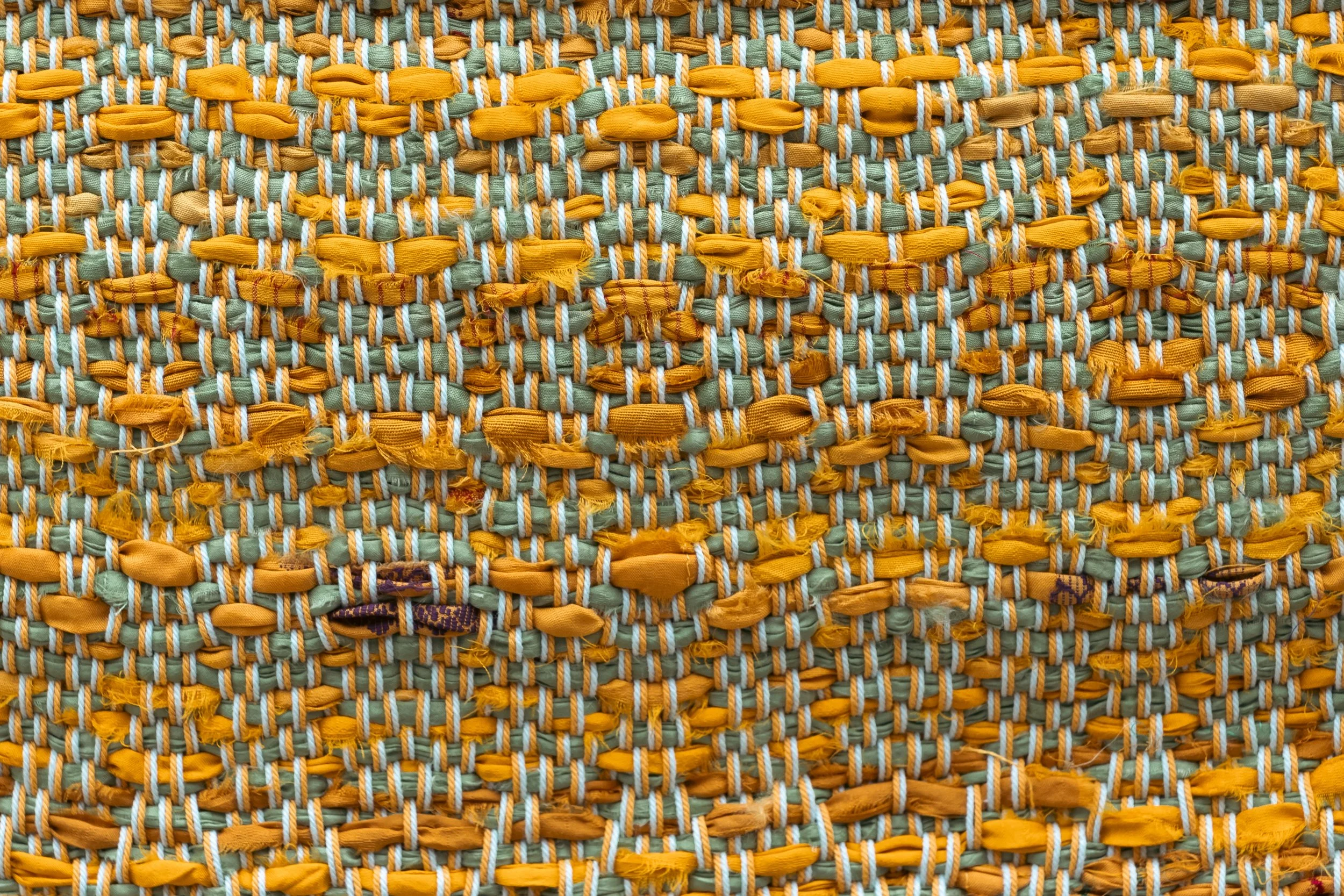 sari silk strips woven through cotton twill