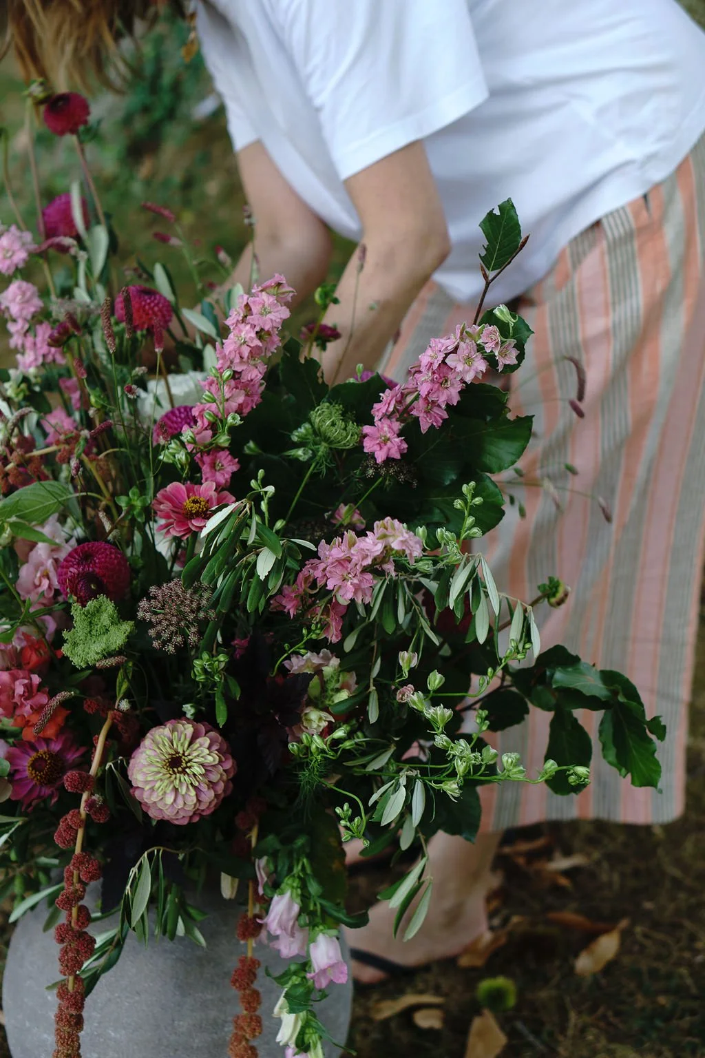 wedding florist with seasonal summer vase at Huntsham Court