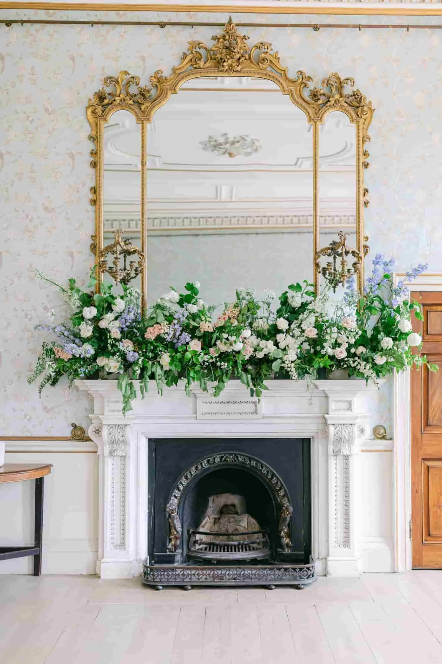 statement mantelpiece flowers at Pynes House