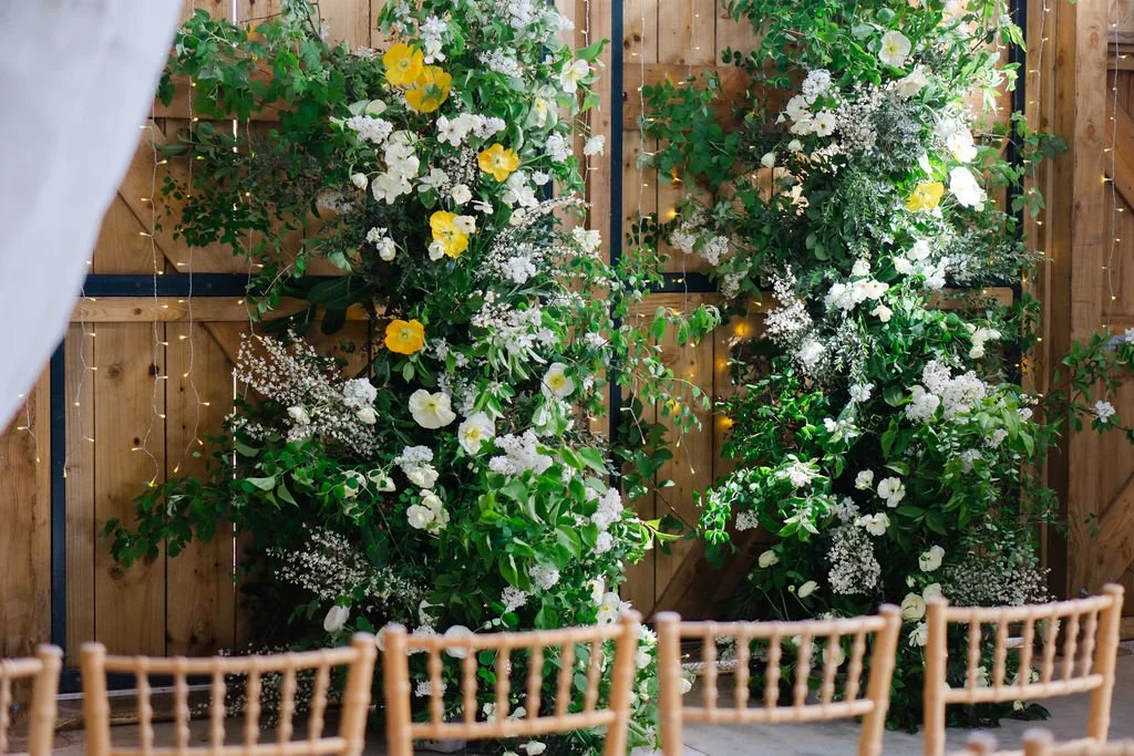 spring broken flower arch for wedding ceremony at Somerset barn venue Pirzwell barn