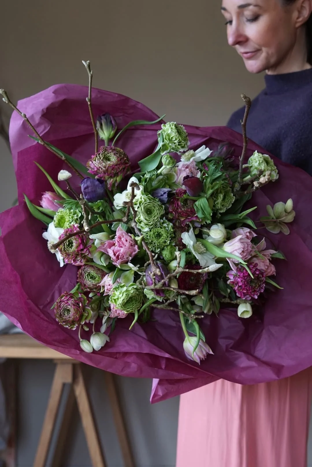 Devon wedding florist holding beautiful seasonal Valentine's Day bouquet