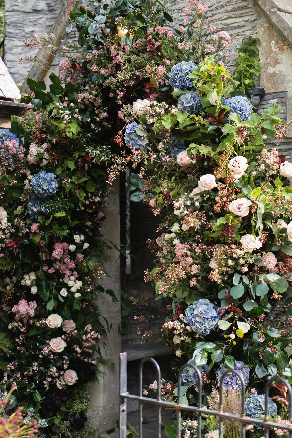 statement flower arch of British flowers at Lee Bay church in North Devon