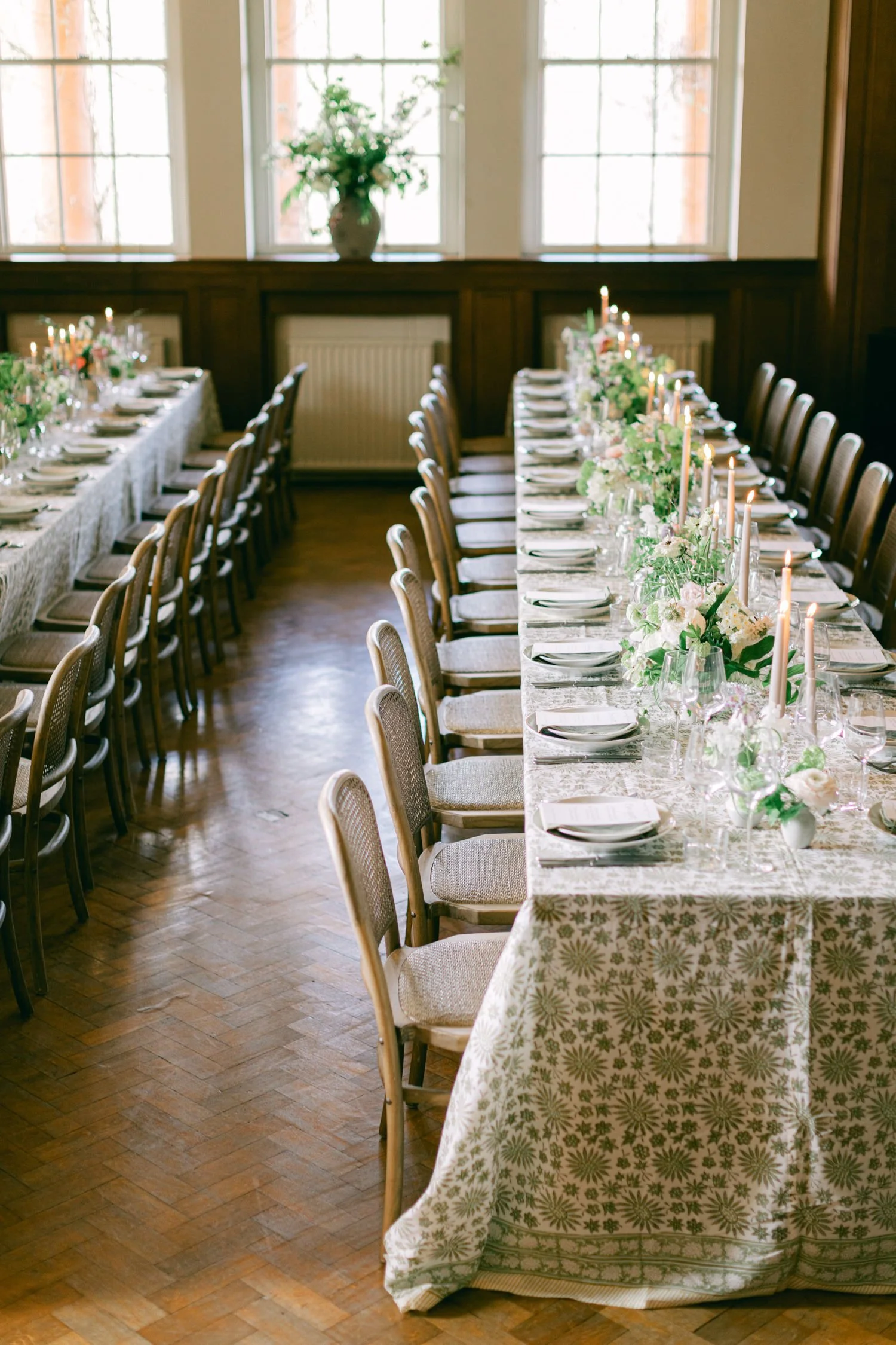 spring wedding tablescape with seasonal elegant low flower bowls with bud vases on patterned linen