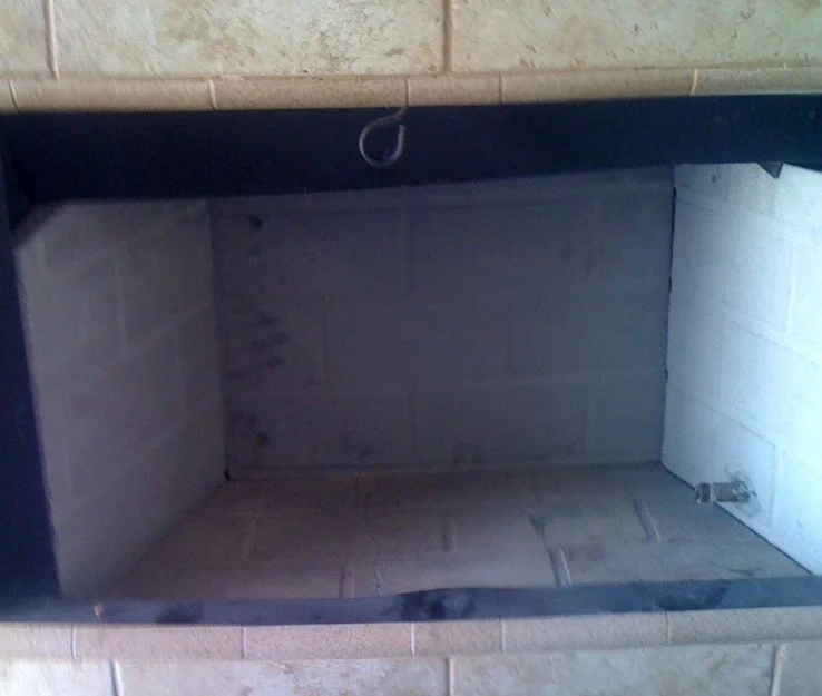 Empty Fireplace with New replaced brick panels