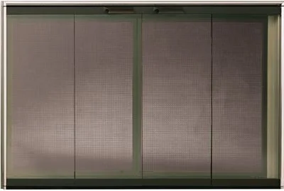 Elevator door with metallic panels and green framing.