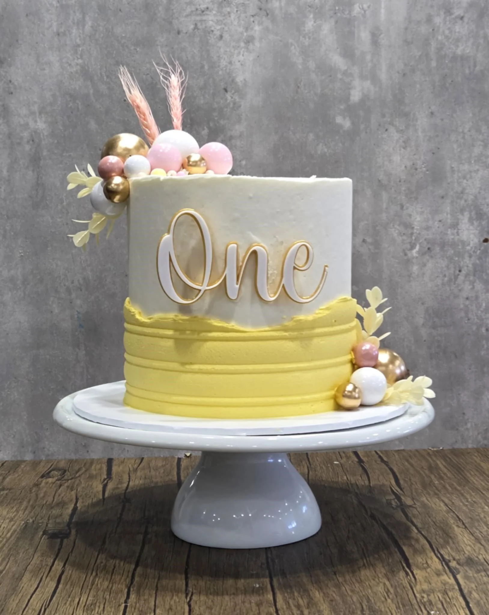 1st birthday cake - yellow-white.jpg