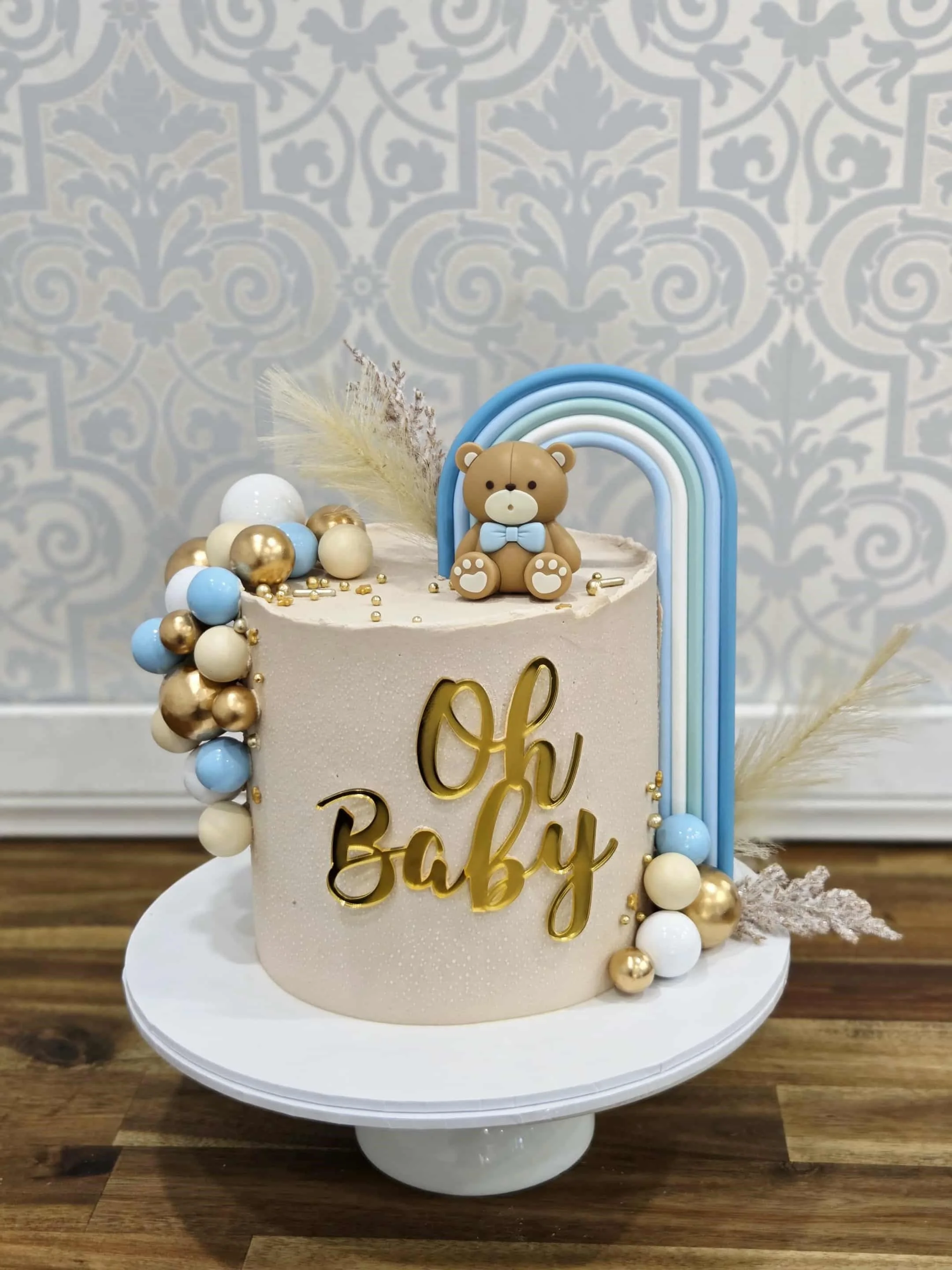 Baby shower cake - blue & gold.jpg
