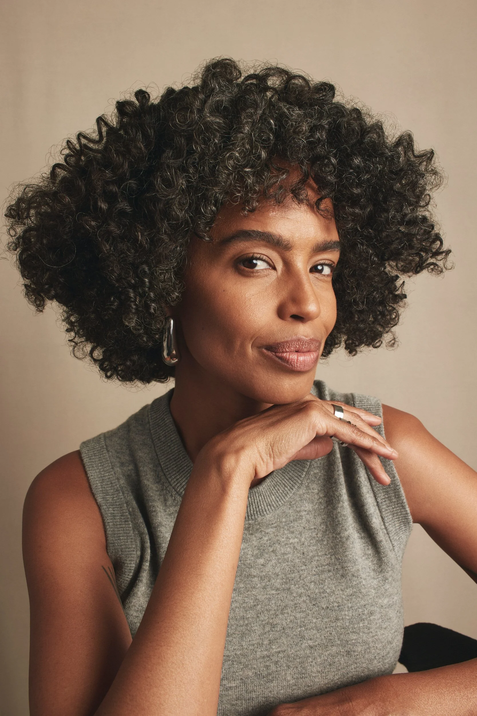 Joshua Pestka commercial beauty photography — Mary Kay TimeWise Repair campaign, close-up portrait with hand on chin, thoughtful expression